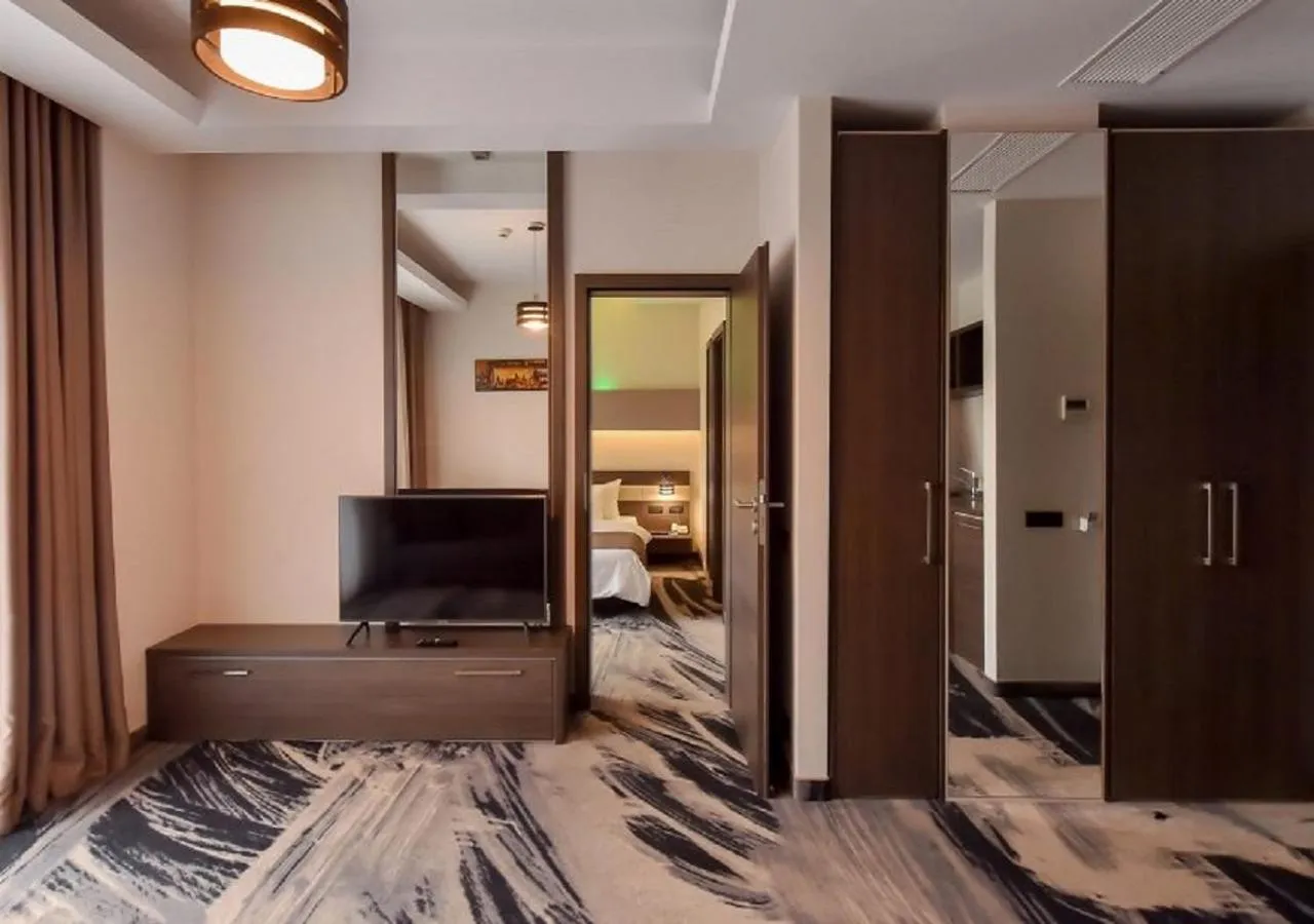 Living room, Bed in Hotel Scapino