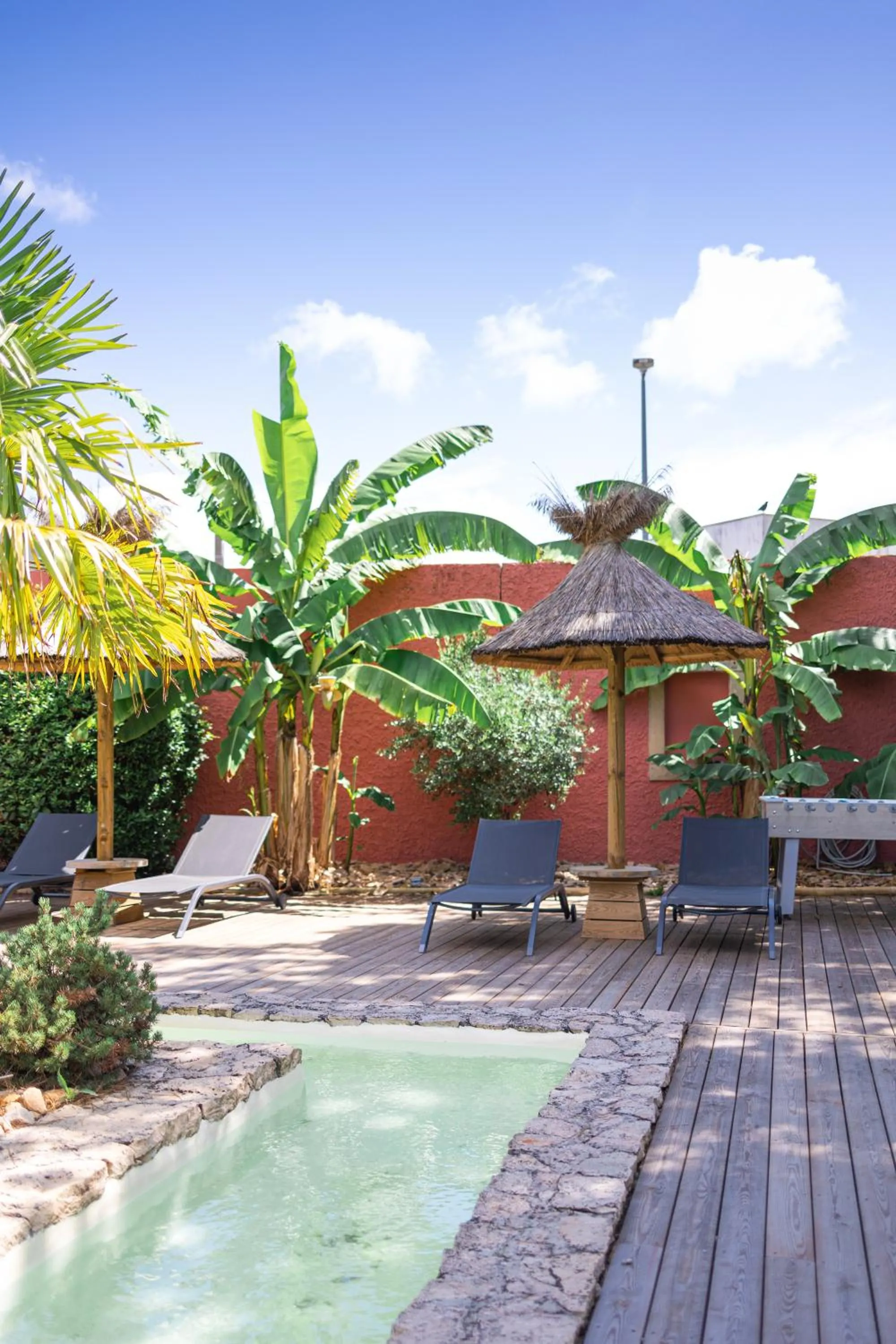 Swimming pool in Hotel Village Motel