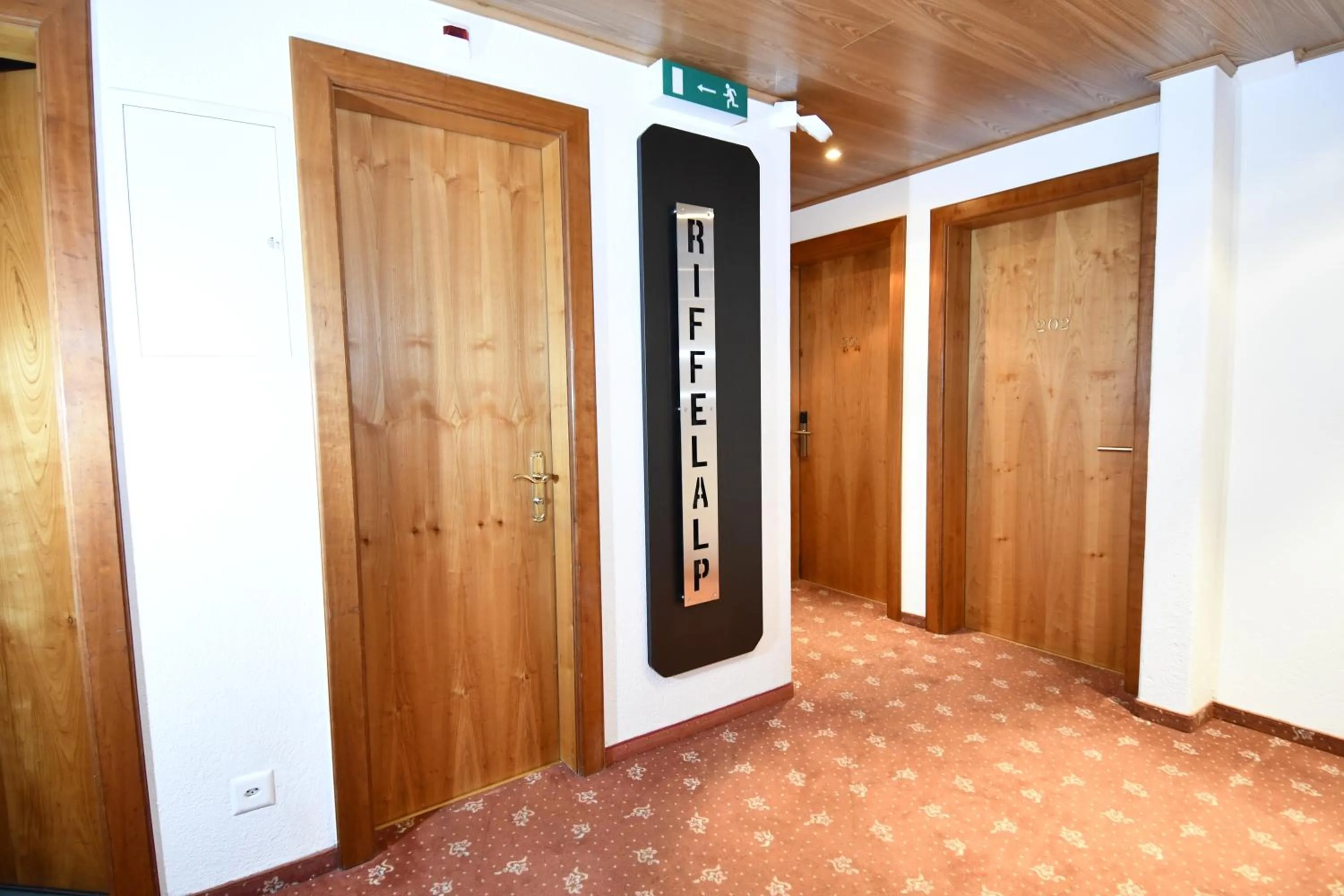 Property logo or sign in Hotel Elite