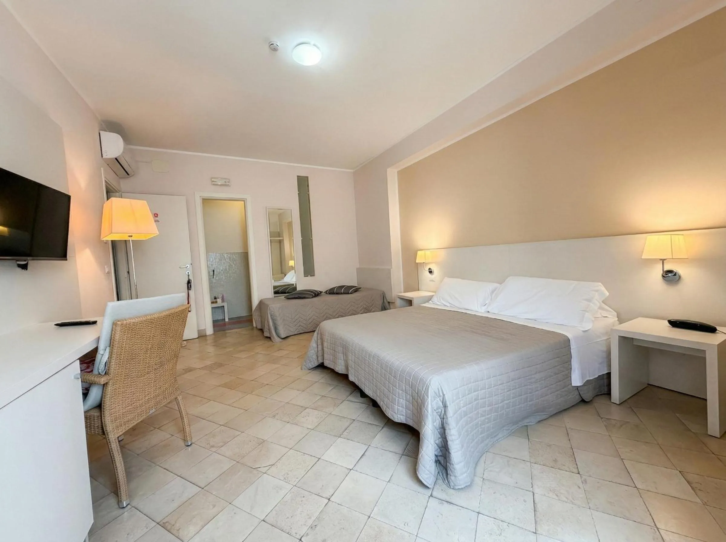 Bed in Ortigia Mastrarua rooms