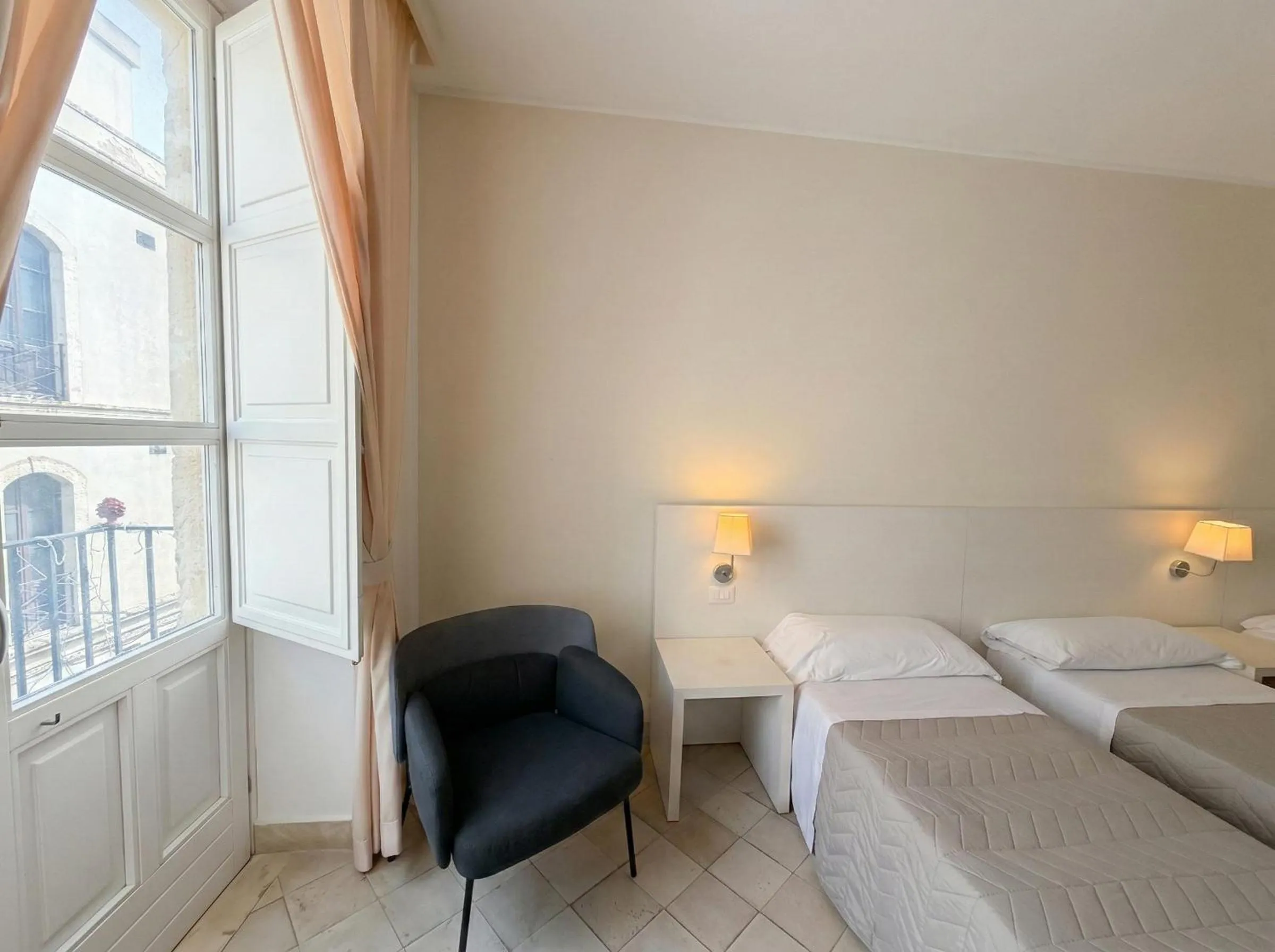 Bed in Ortigia Mastrarua rooms