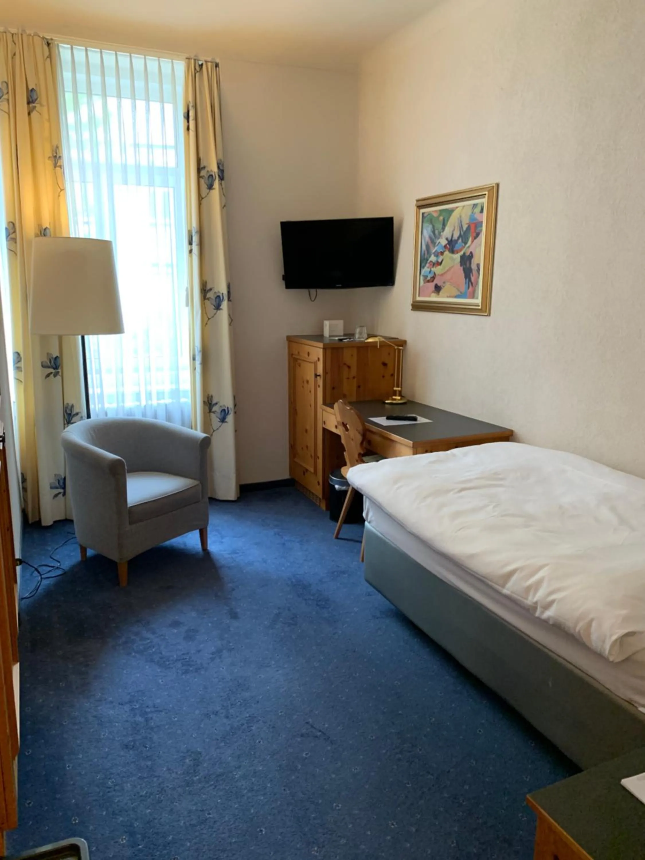 Photo of the whole room, Bed in Morosani Schweizerhof