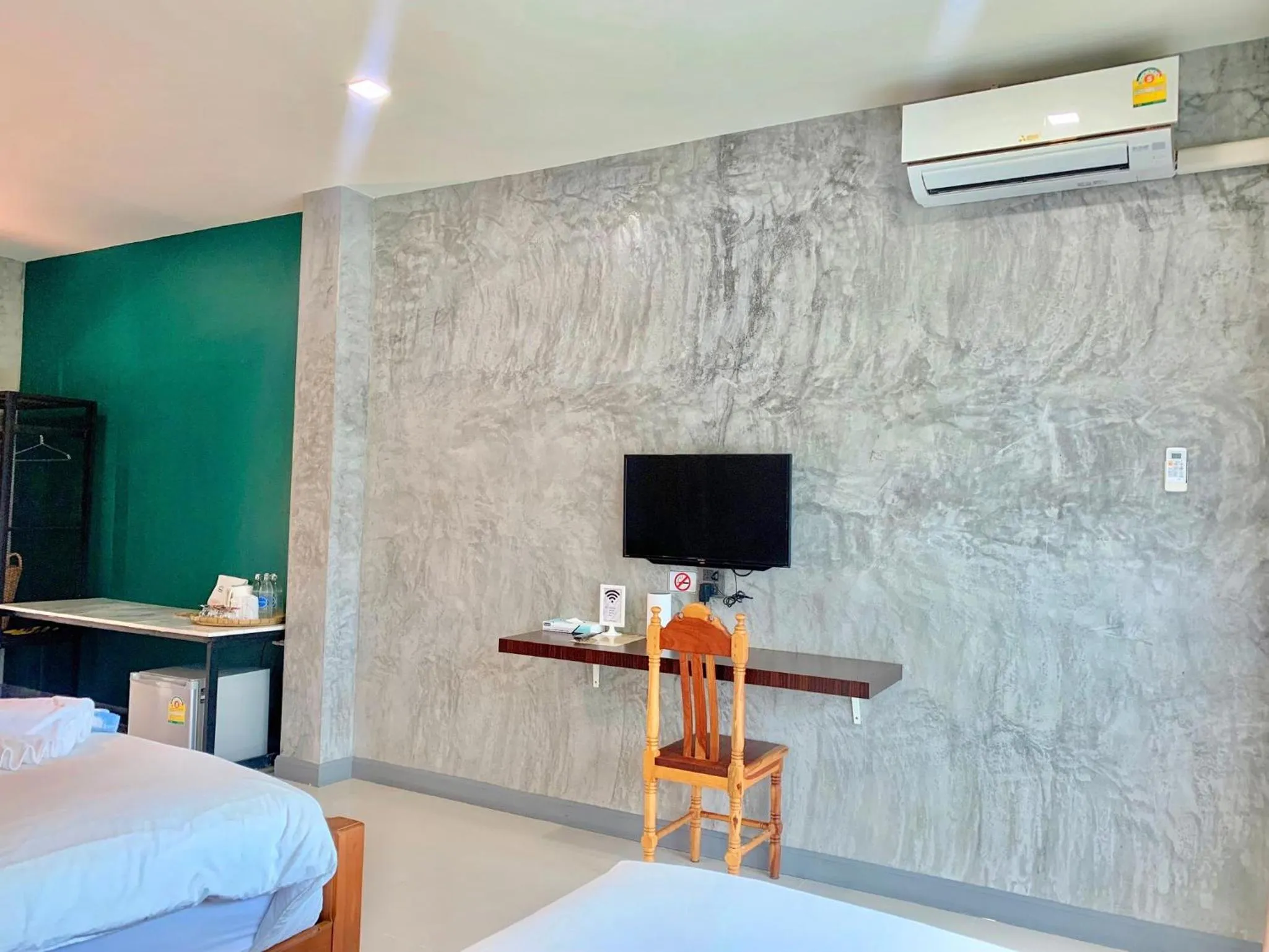 Bed in Hug Sakhonnakhon Hotel