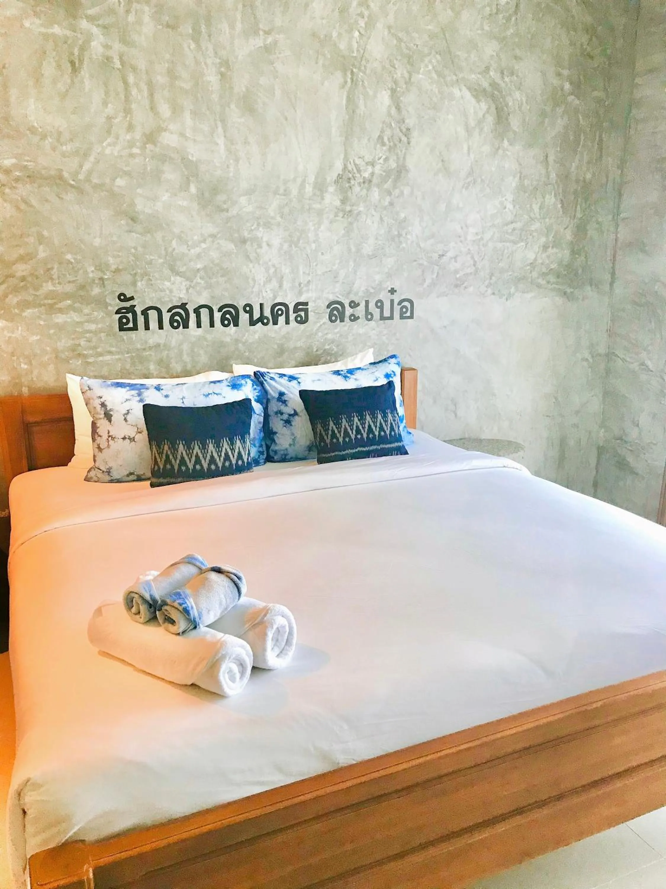 Bed in Hug Sakhonnakhon Hotel