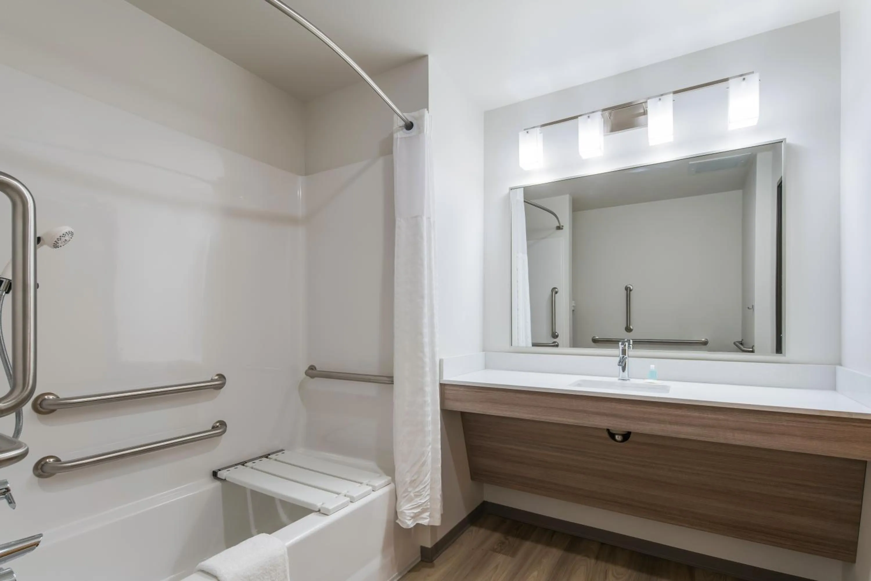 Bath in WoodSpring Suites Tri-Cities Richland