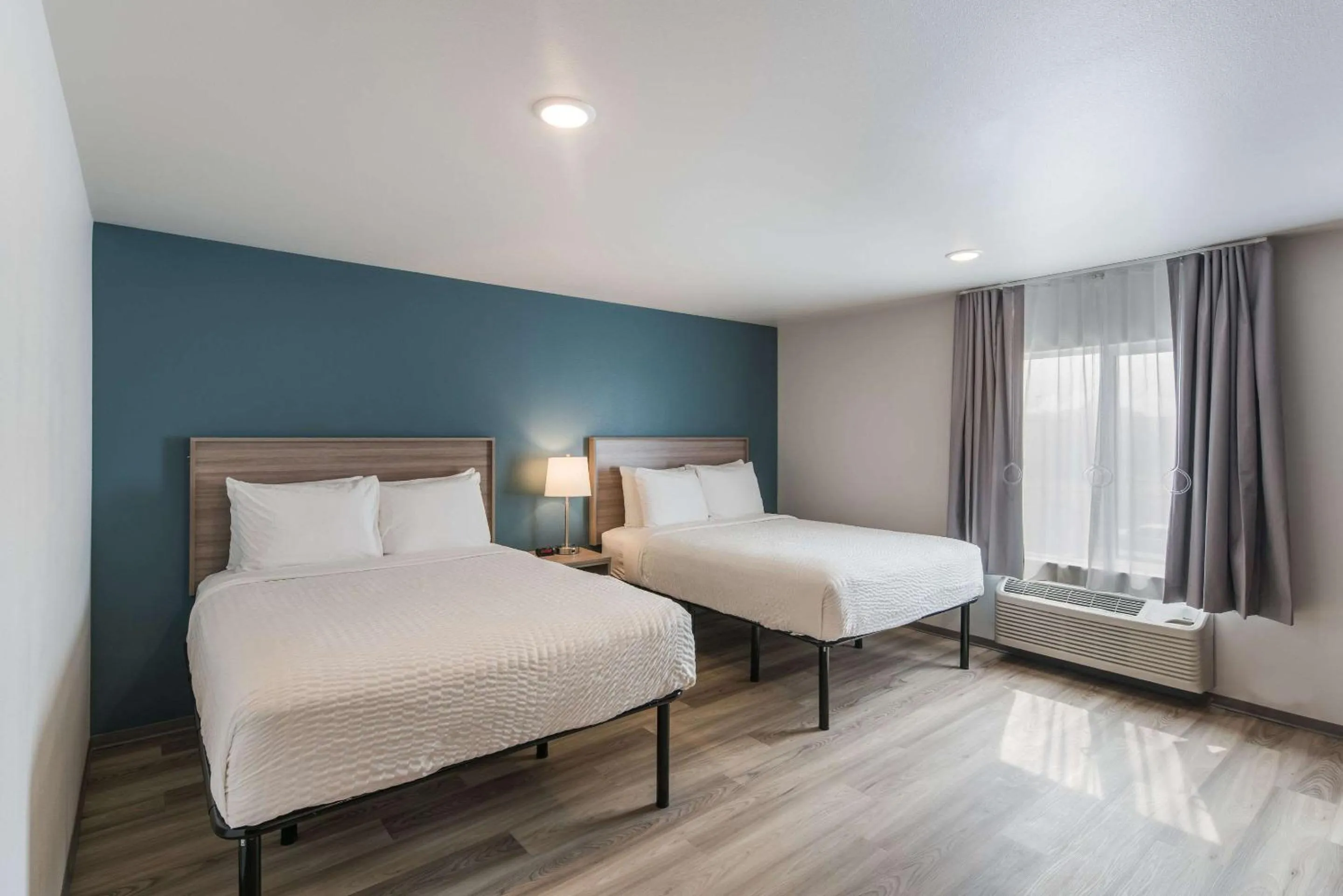 Photo of the whole room, Bed in WoodSpring Suites Tri-Cities Richland