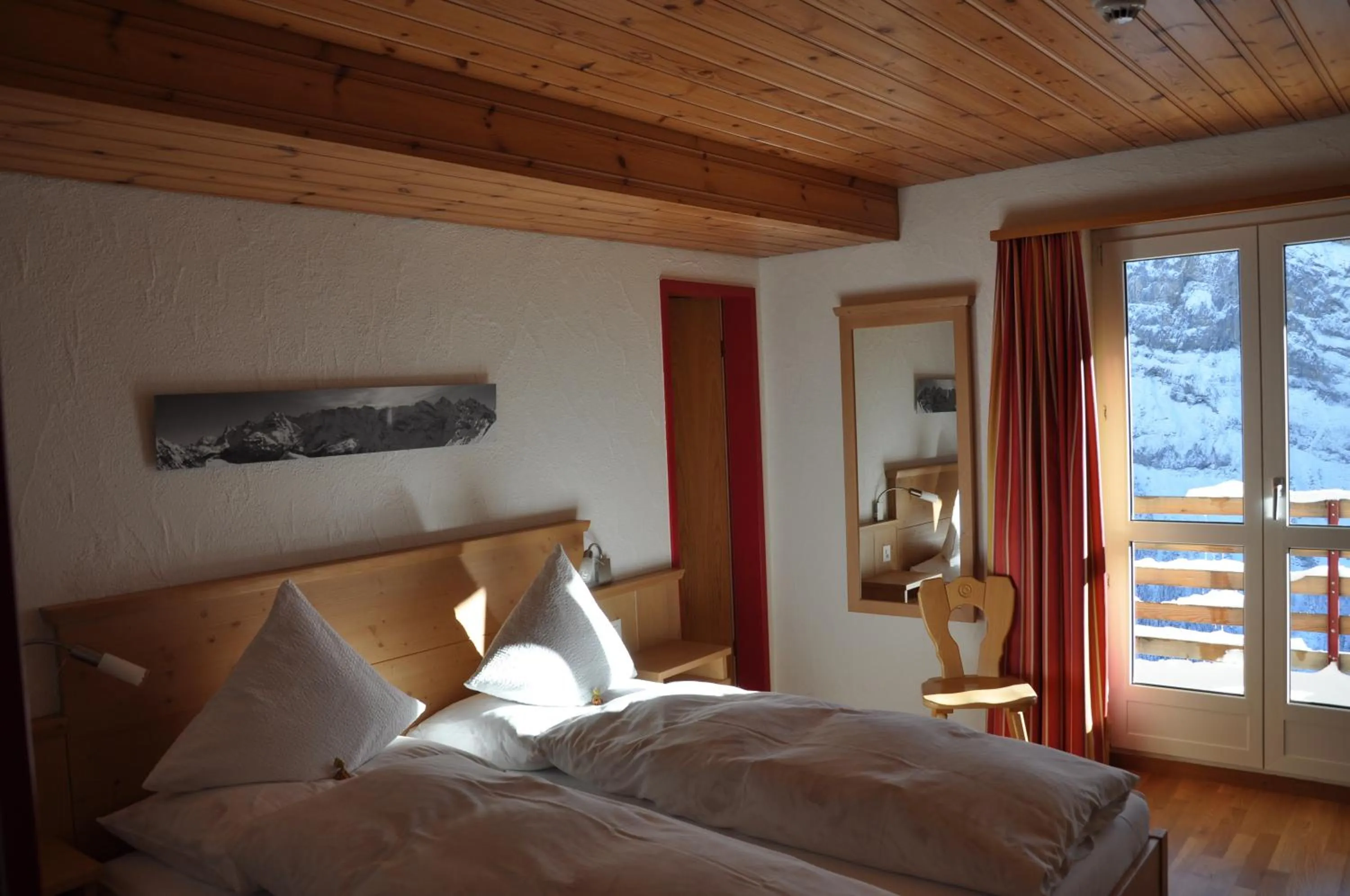 Bed in Hotel Edelweiss Superior