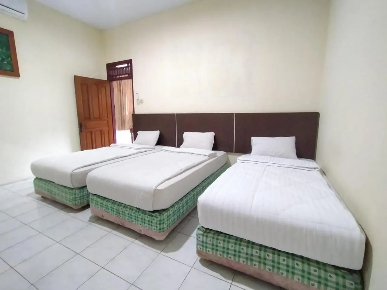 Bed in Grand Mutiara Hotel Puncak