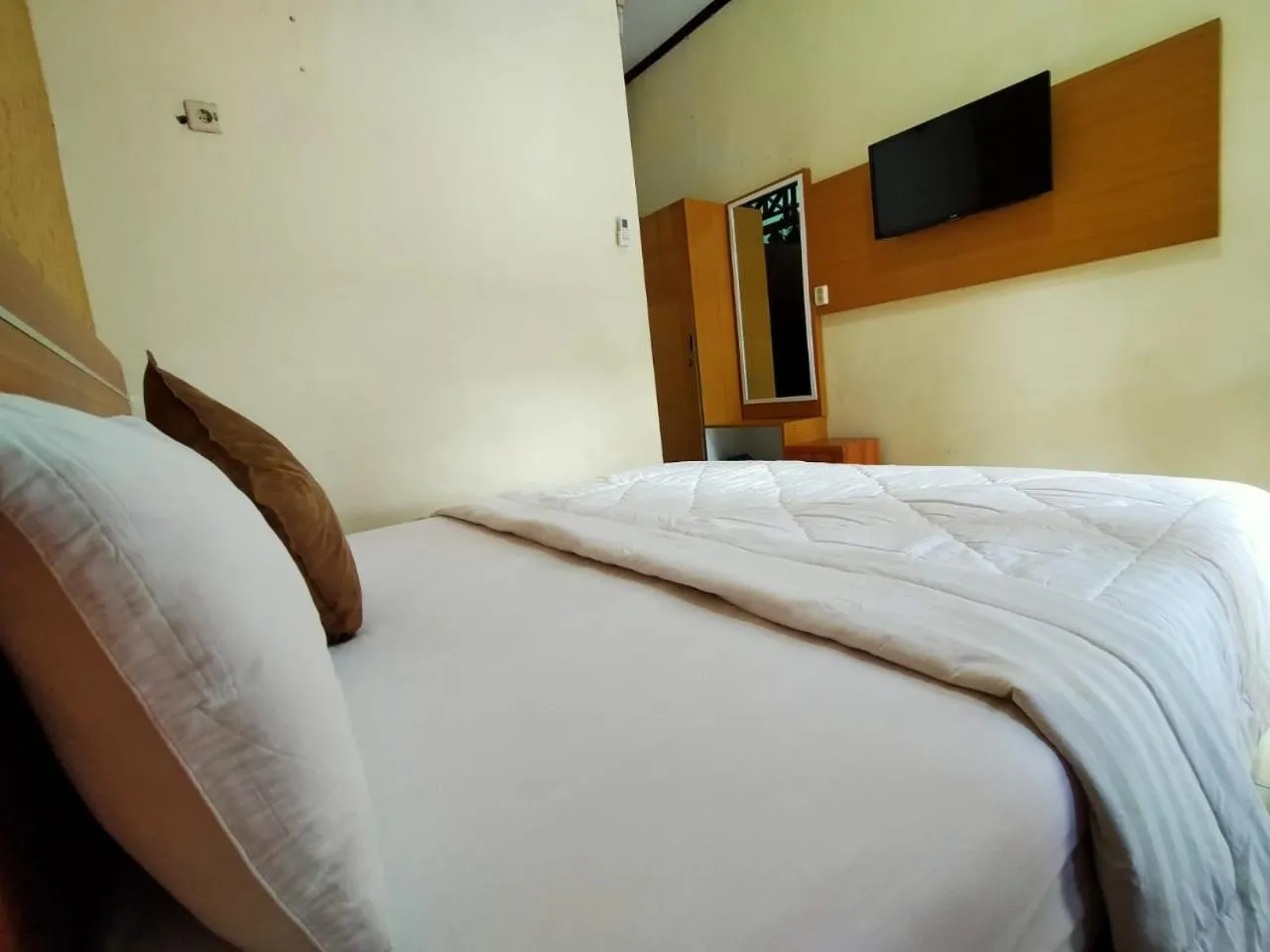 Bed in Grand Mutiara Hotel Puncak