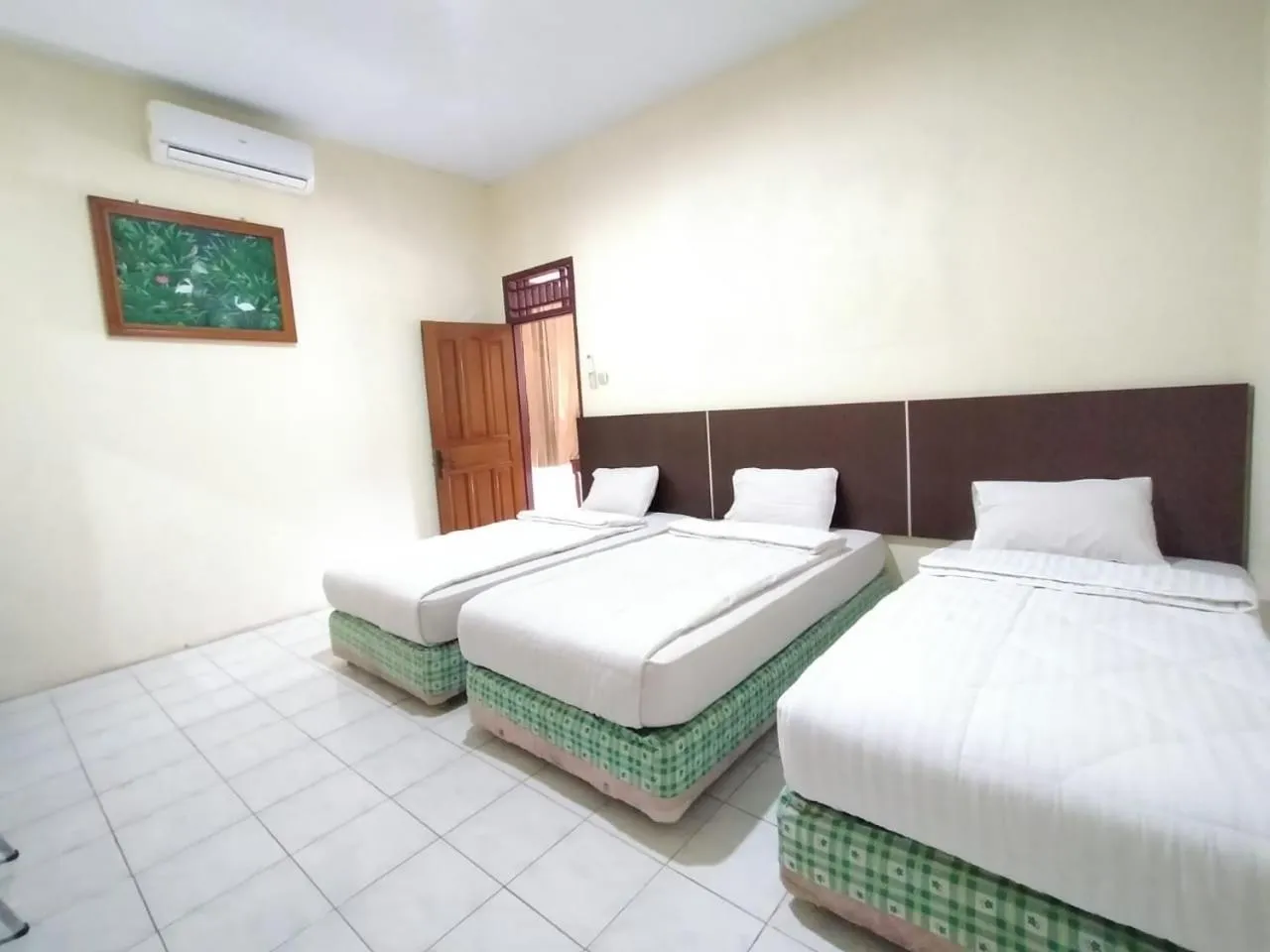 Bed in Grand Mutiara Hotel Puncak
