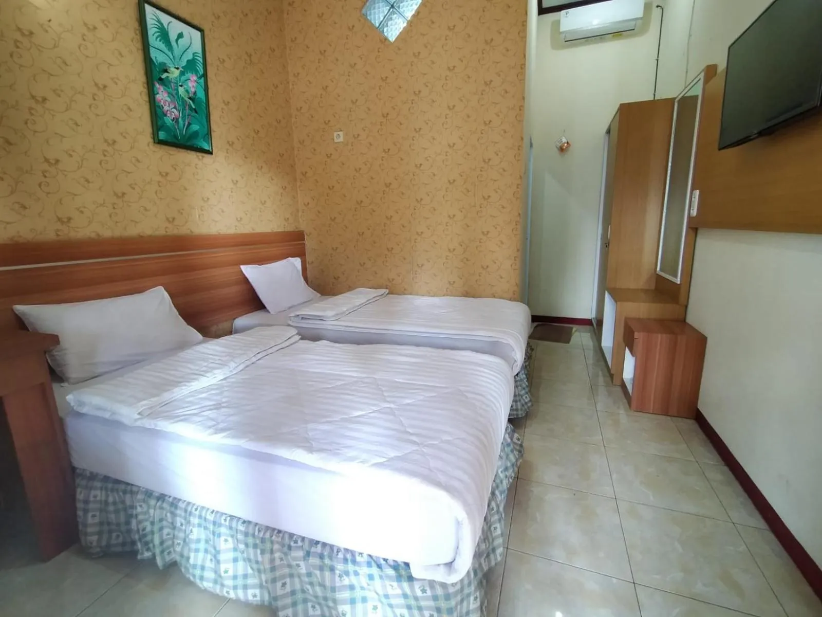 Bed in Grand Mutiara Hotel Puncak