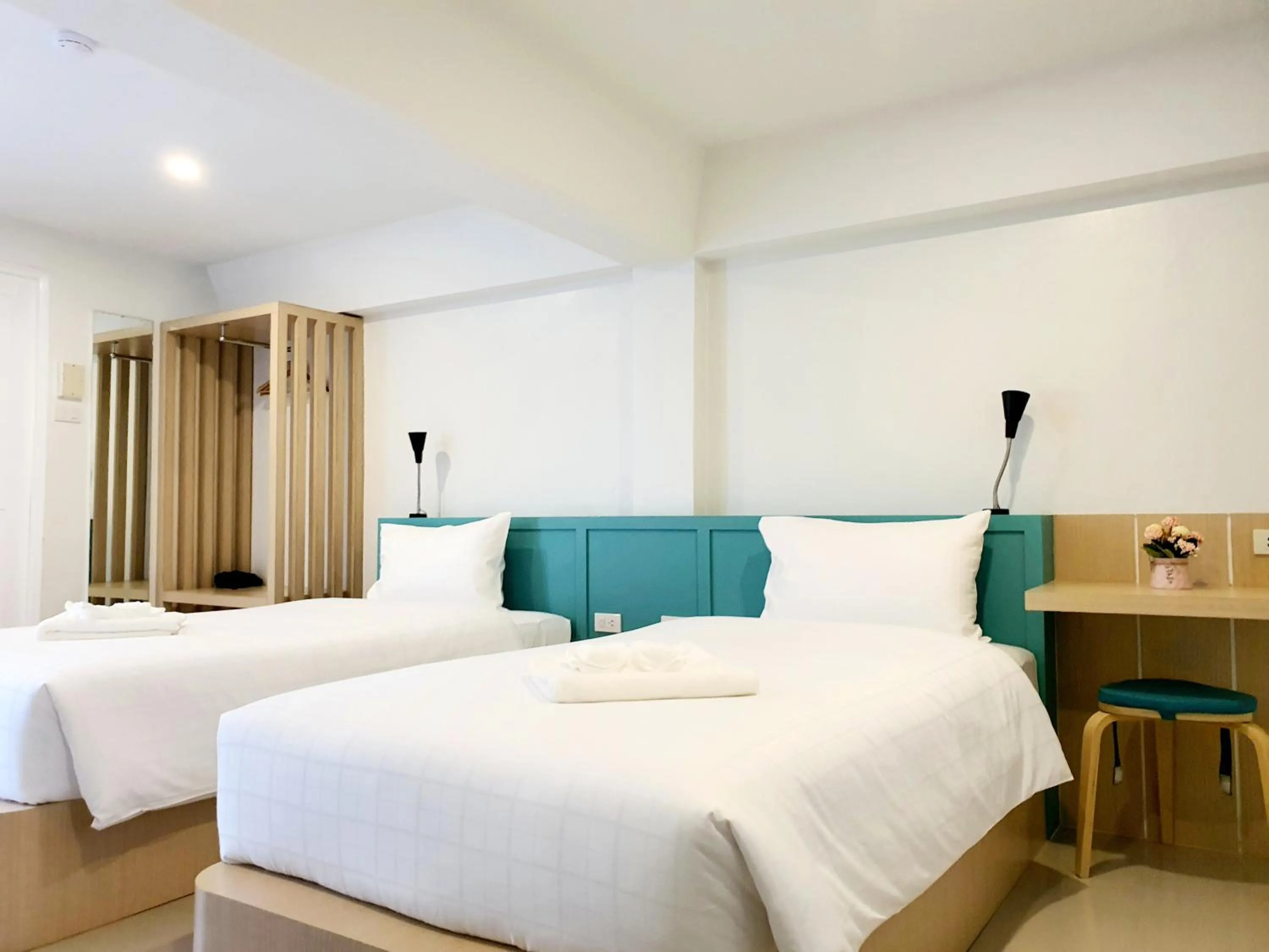 Bed in Tiny Krabi Hotel