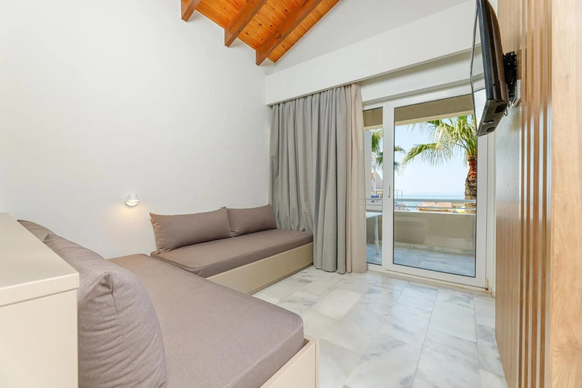 Seating area, Bed in Kostakis Beach