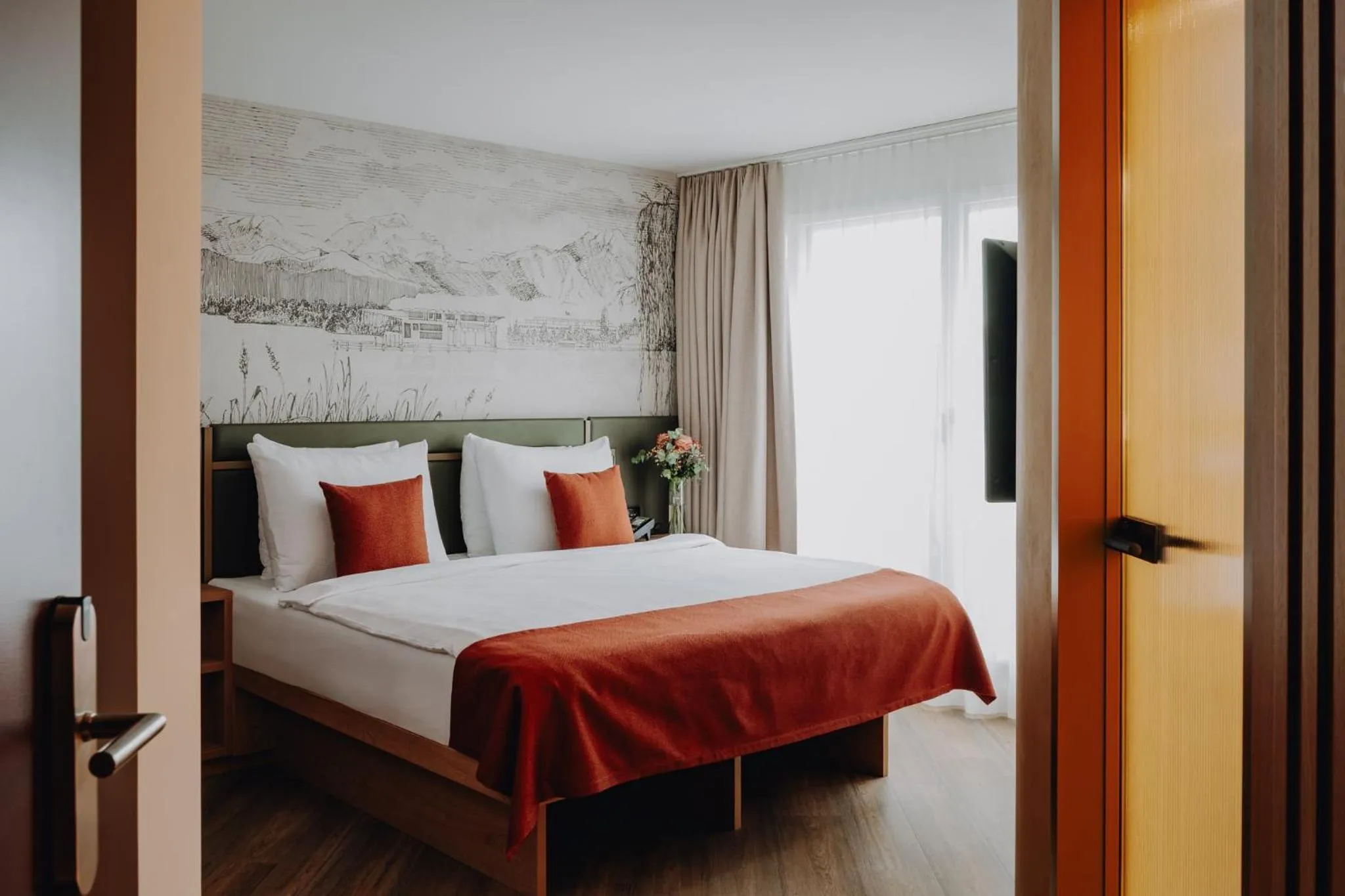 Photo of the whole room, Bed in AMERON Luzern Hotel Flora