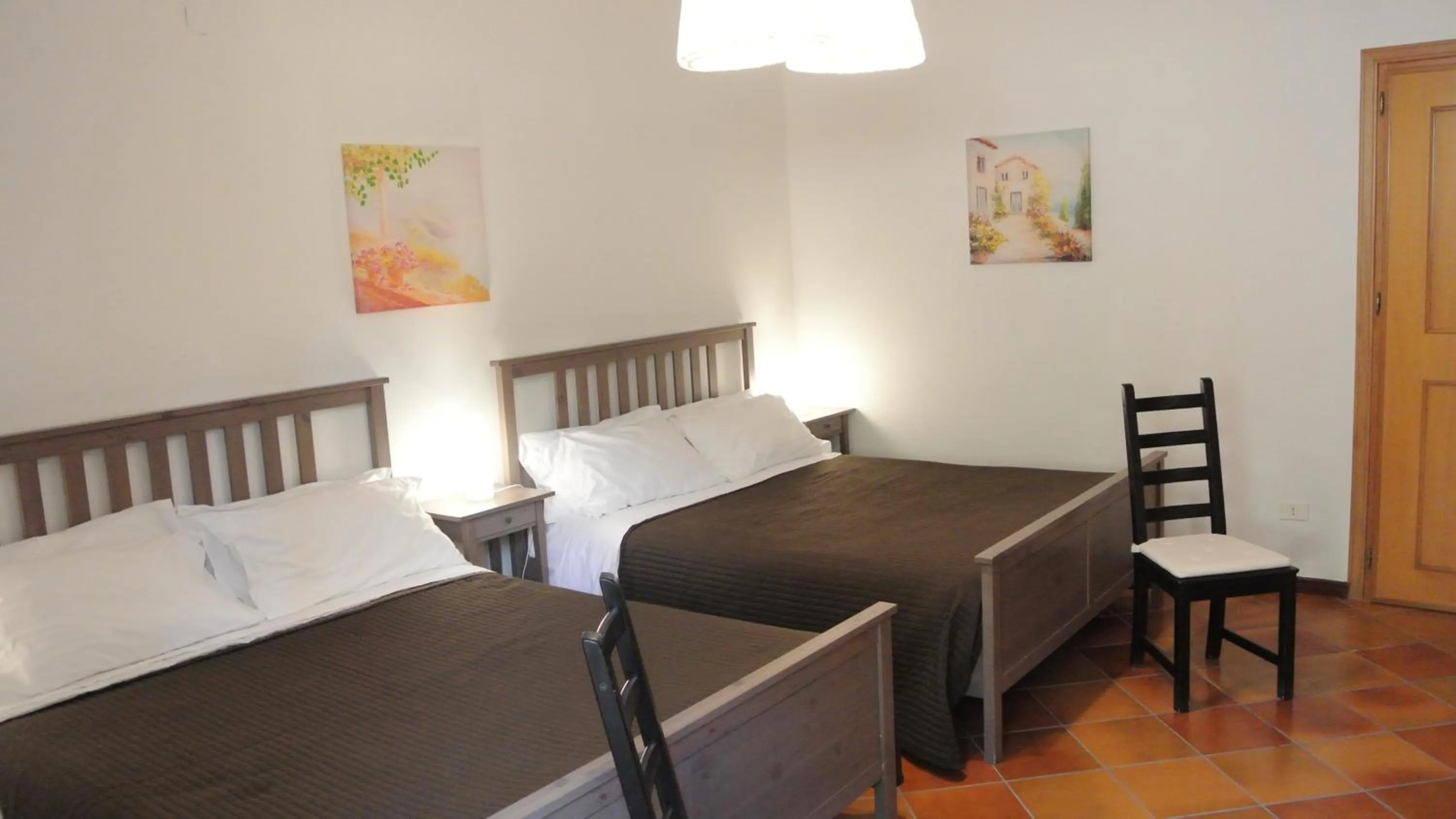 Bedroom in Villa Carlotta Resort