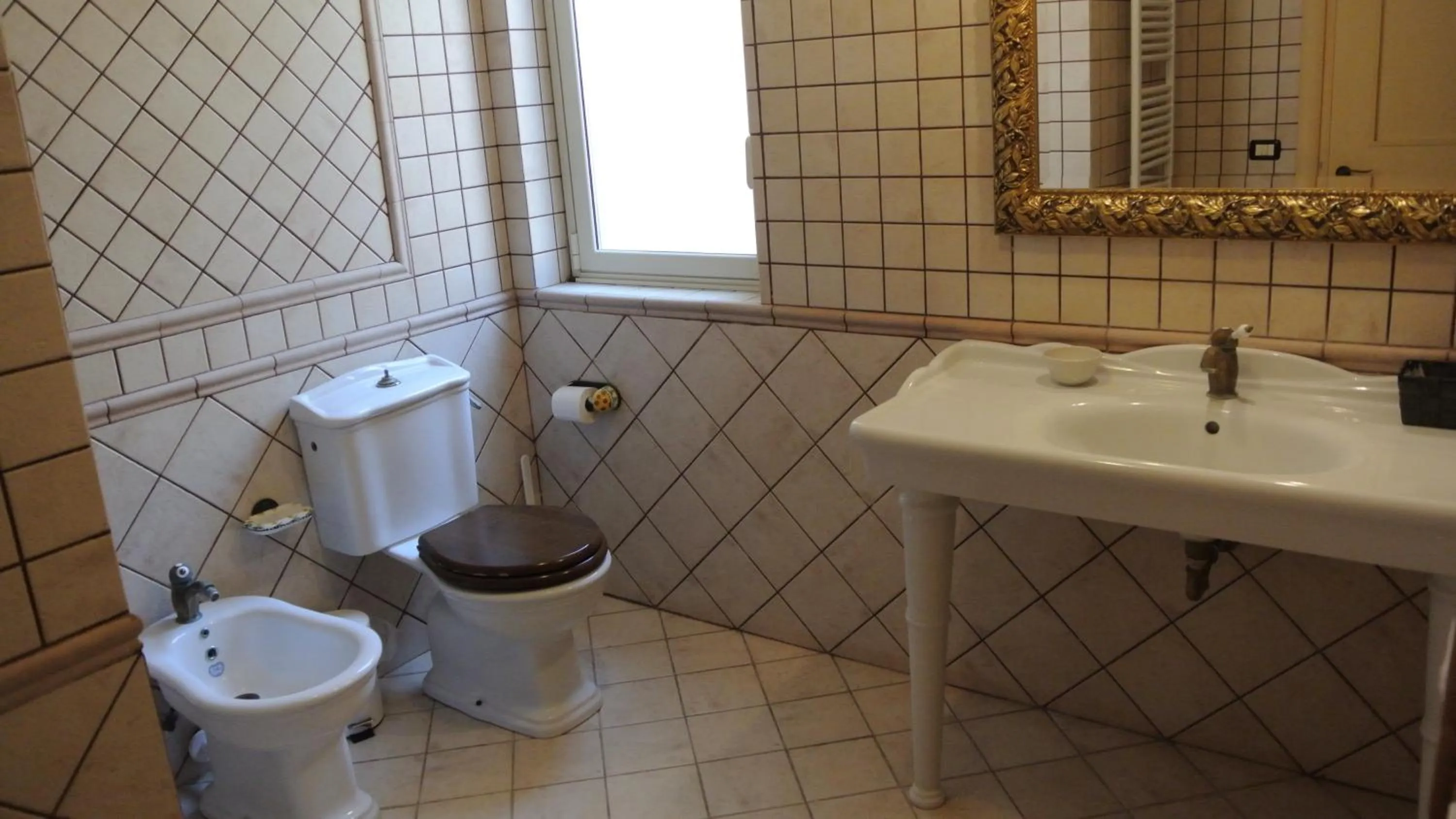 Bathroom in Villa Carlotta Resort