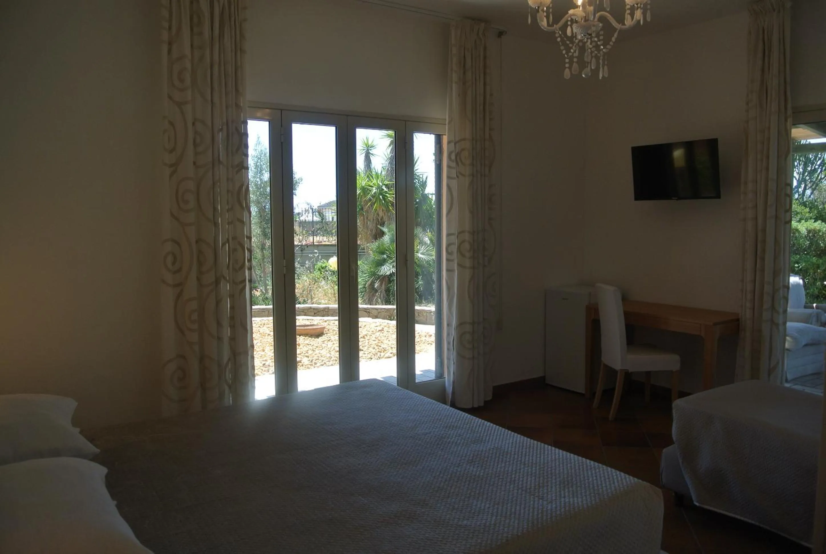 Bedroom, Bed in Villa Carlotta Resort