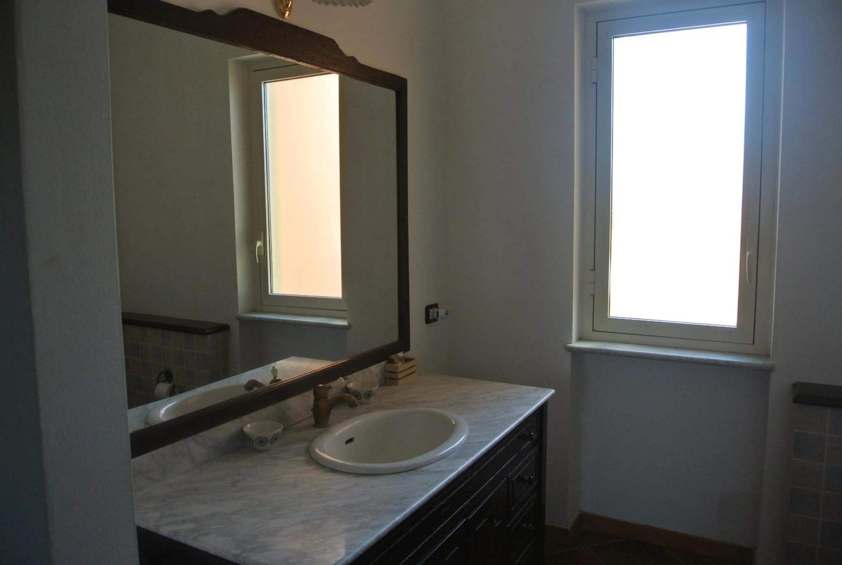Bathroom in Villa Carlotta Resort