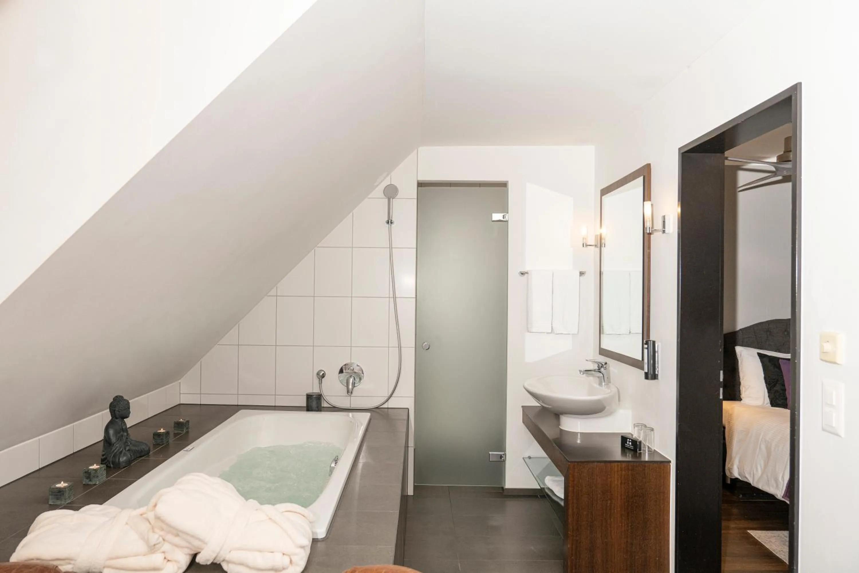 Bathroom, Bed in Boutique Hotel Weisses Kreuz - Adult only Hotel