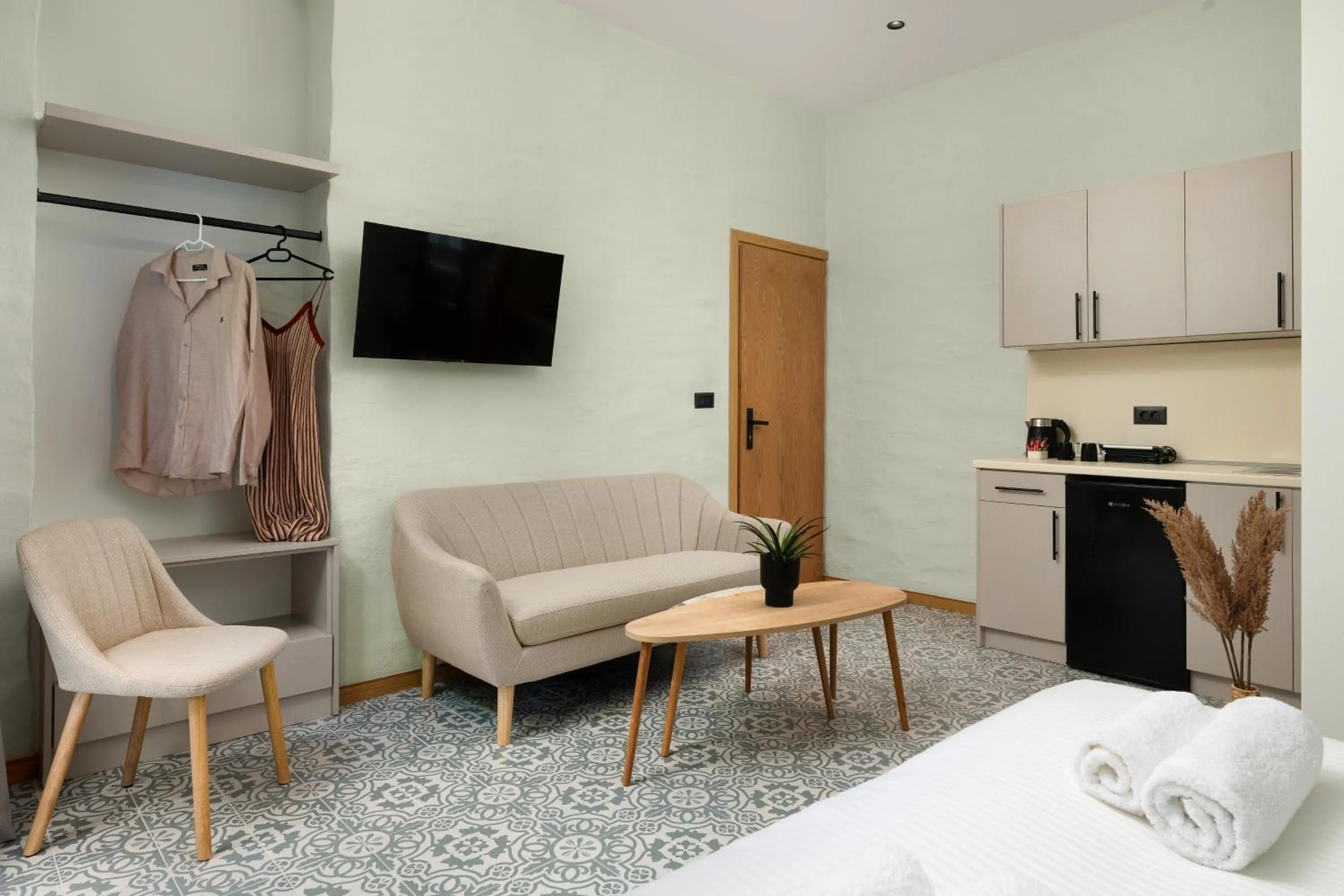 TV and multimedia, Bed in Acandia Hotel