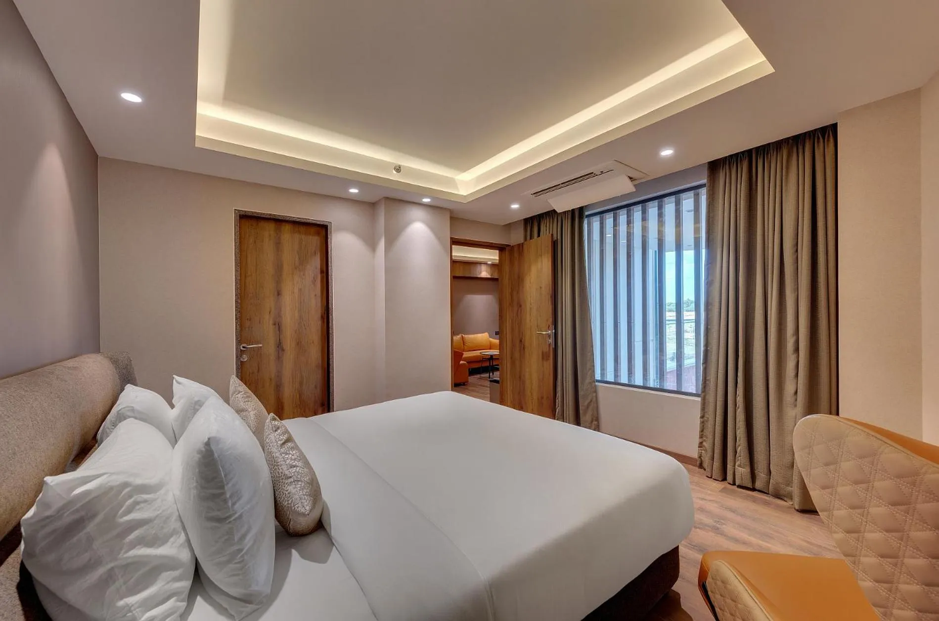 Bed in The Fern Royal Farm Resort, Anjar