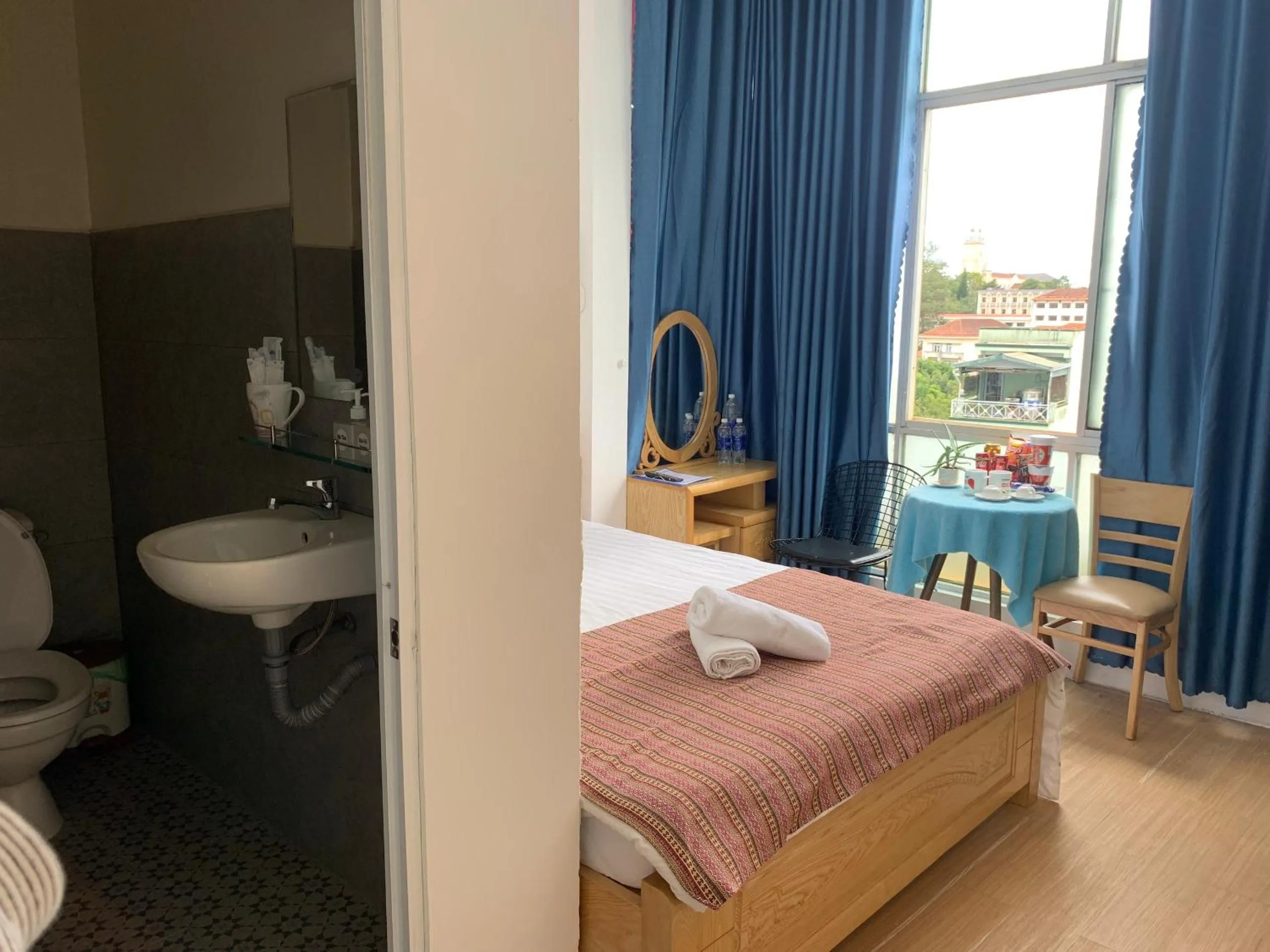 Bathroom, Bed in Chau Giang Hotel