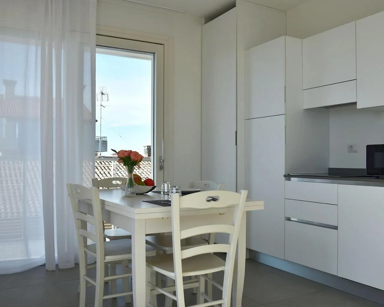 Kitchen or kitchenette in Residence Al Molo - Agenzia Cocal