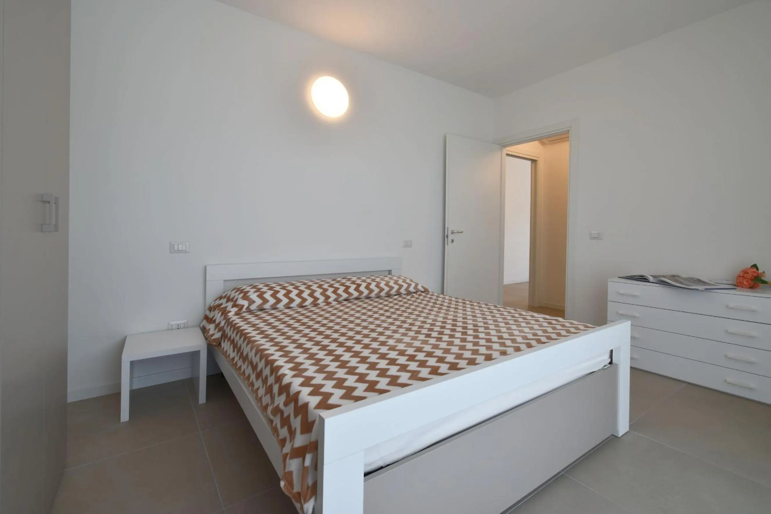 Bedroom in Residence Al Molo - Agenzia Cocal