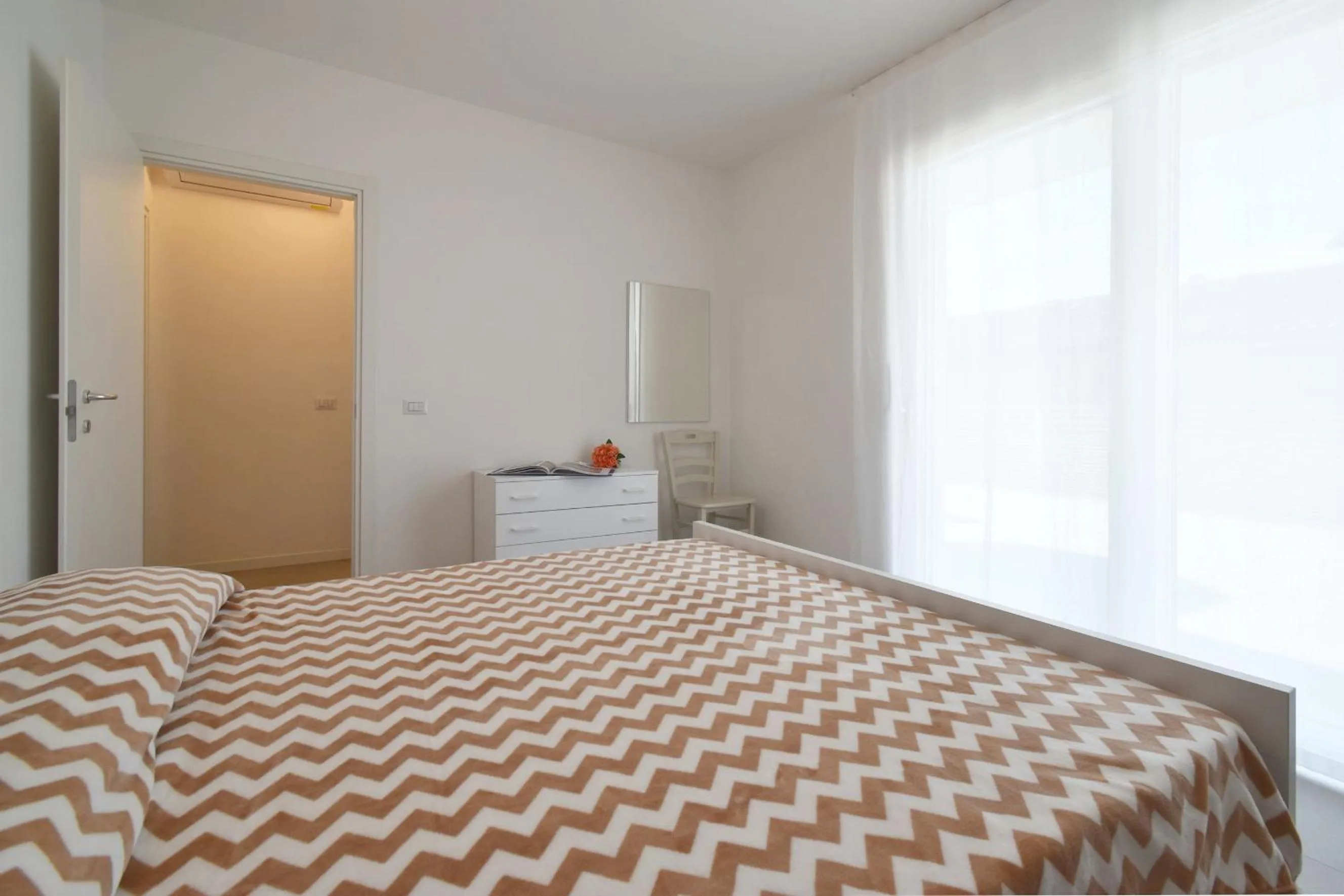 Bedroom in Residence Al Molo - Agenzia Cocal