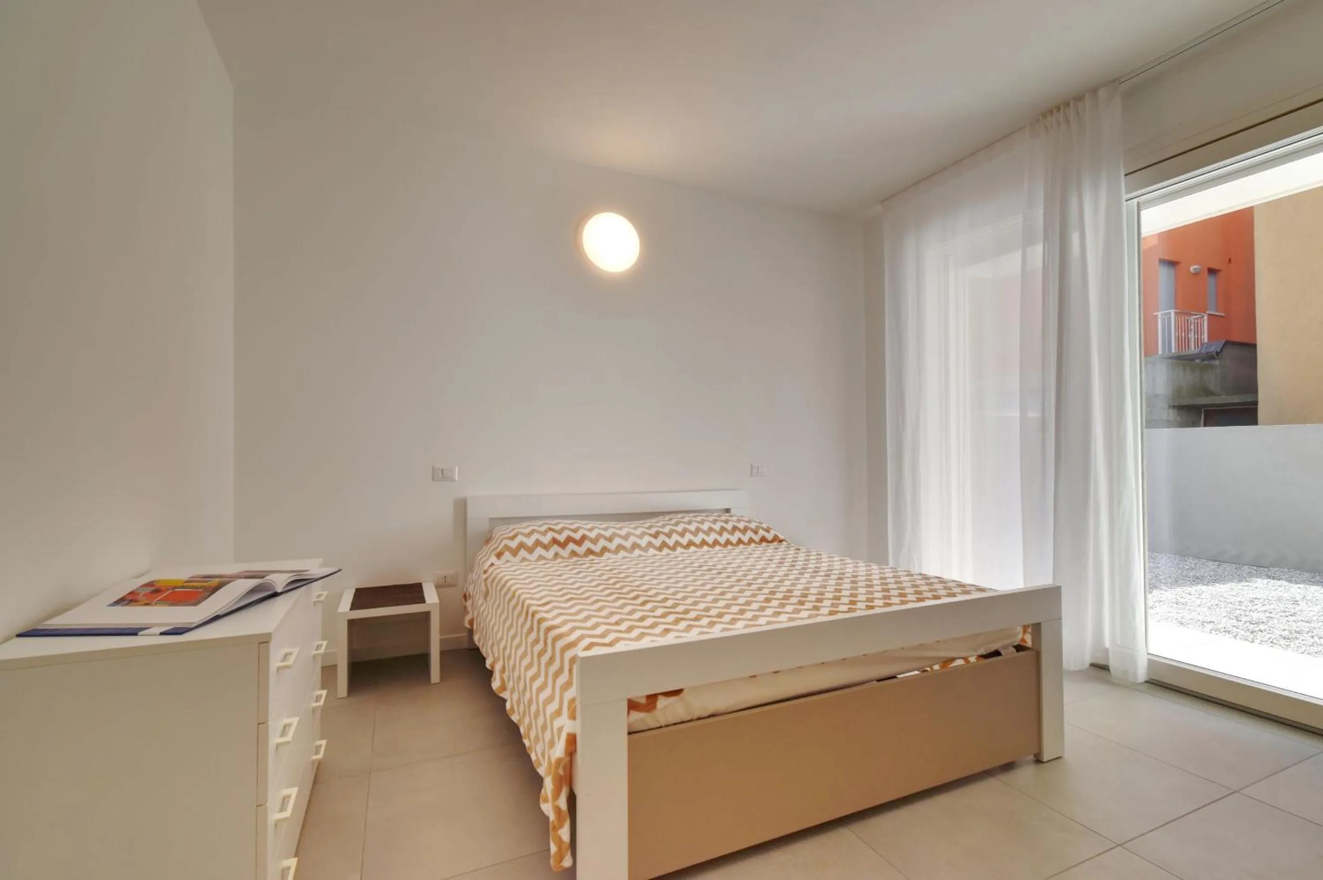 Bedroom in Residence Al Molo - Agenzia Cocal