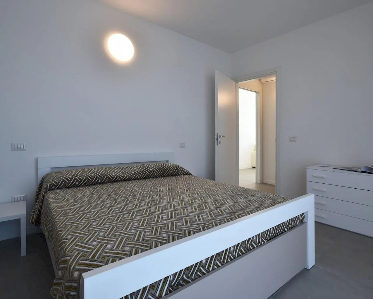 Bedroom in Residence Al Molo - Agenzia Cocal