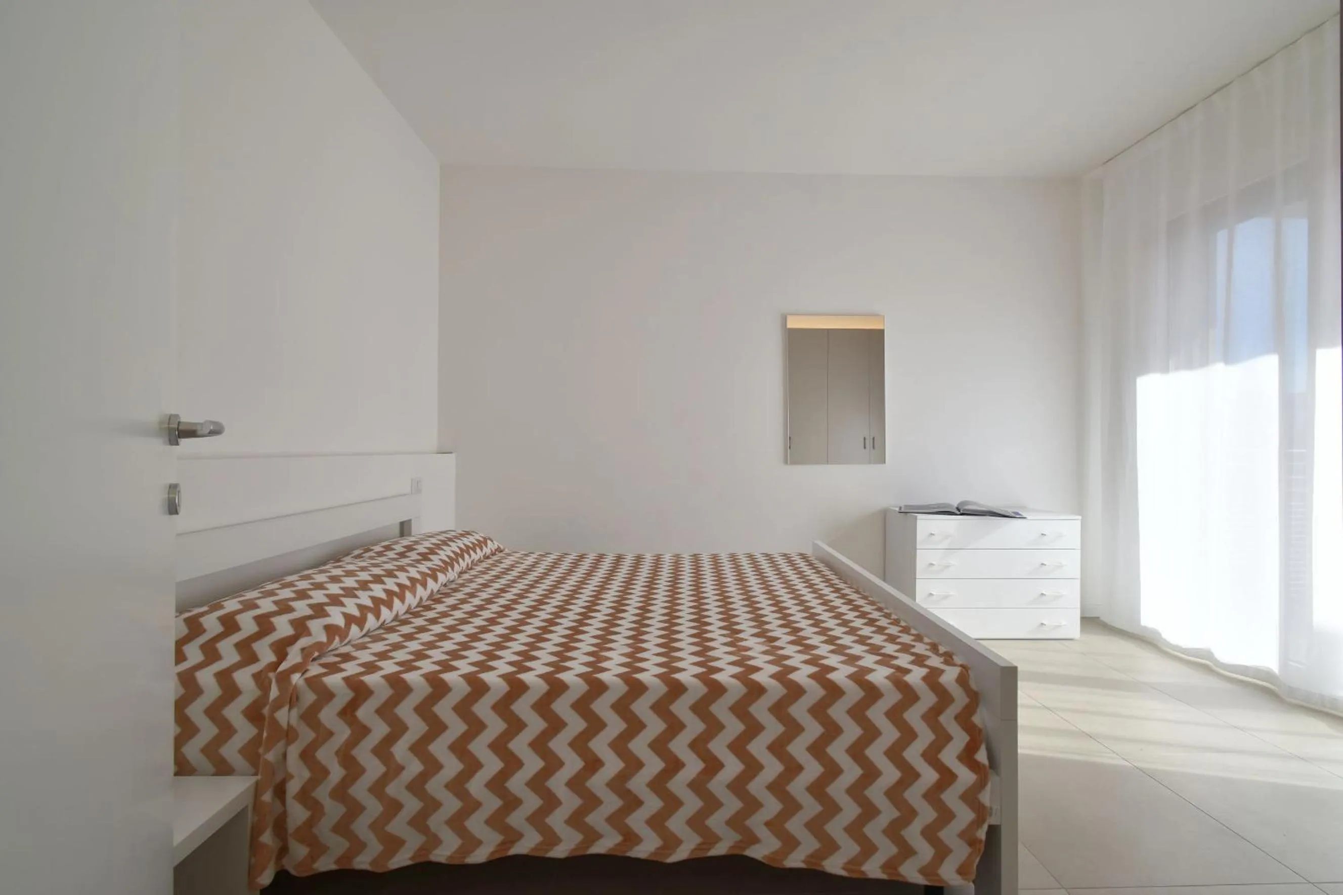 Bedroom in Residence Al Molo - Agenzia Cocal