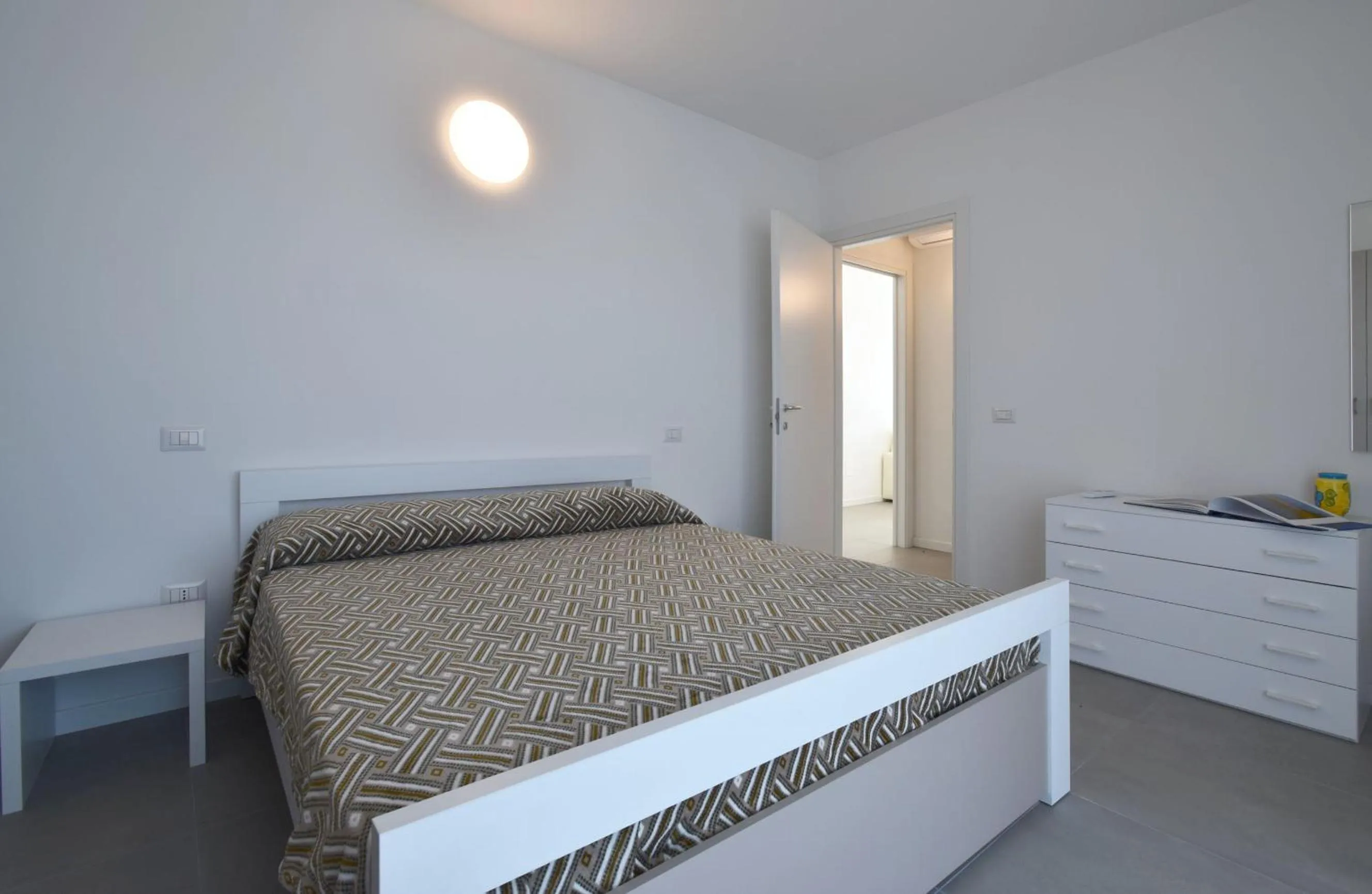 Bedroom in Residence Al Molo - Agenzia Cocal