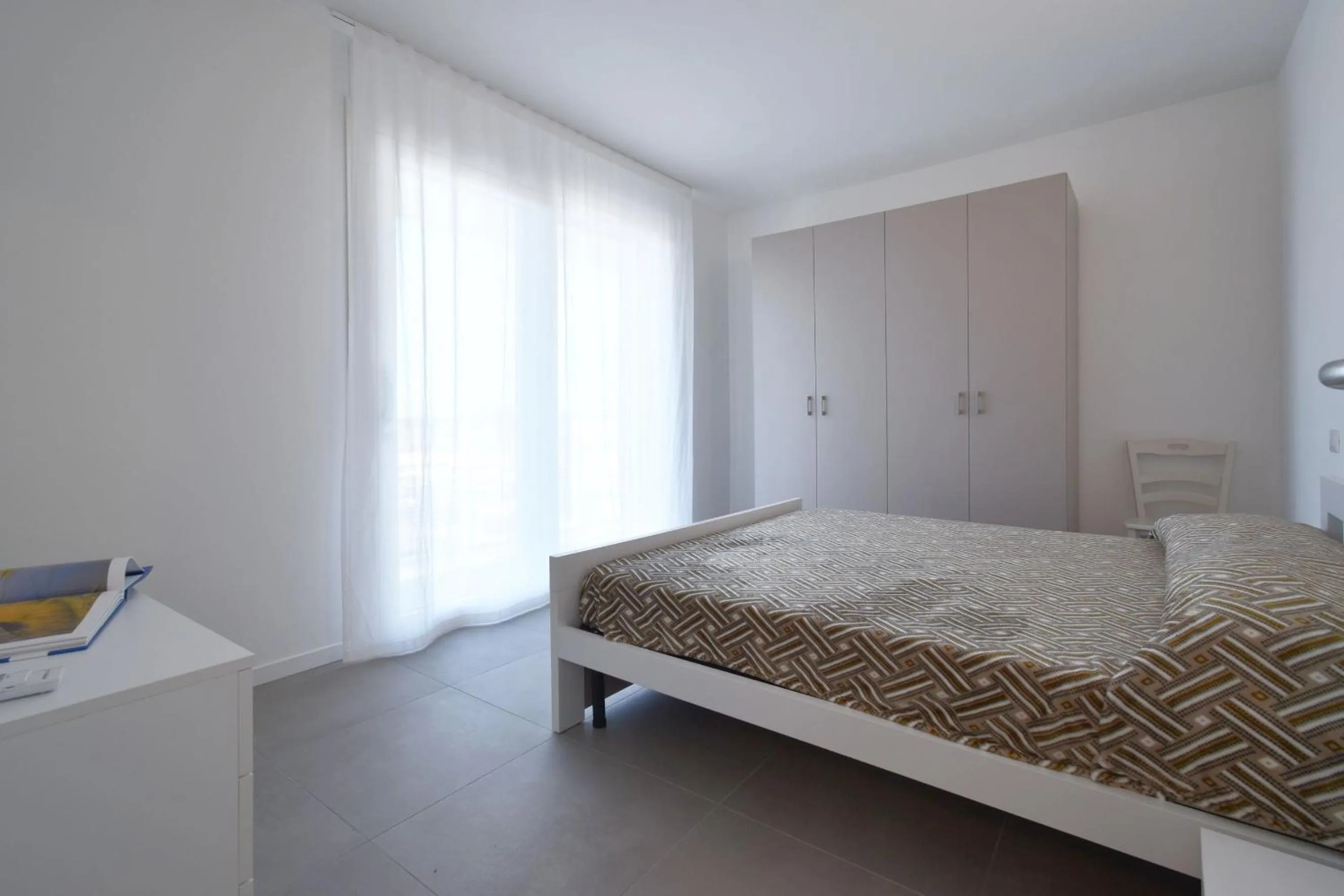 Bedroom in Residence Al Molo - Agenzia Cocal