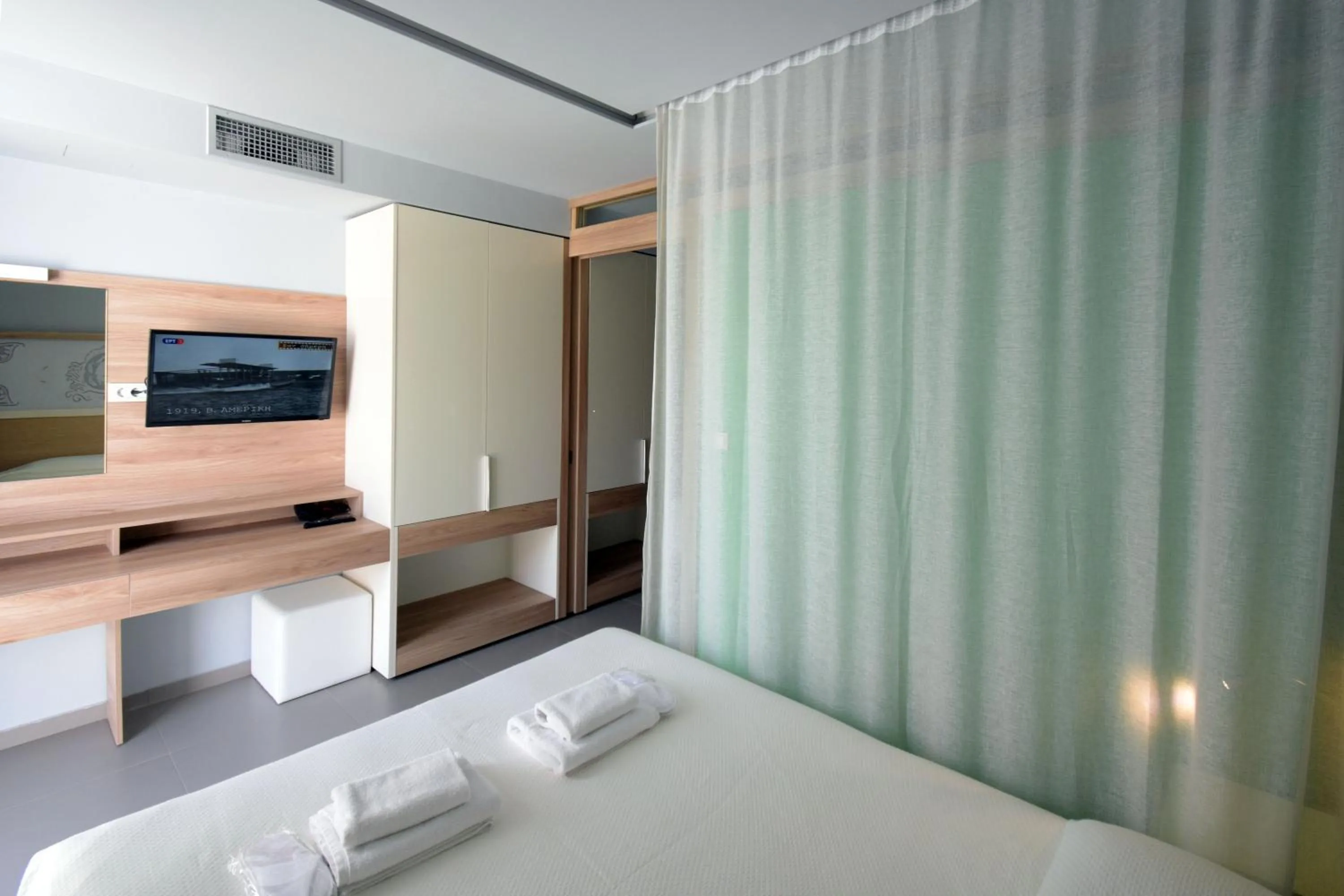 Bed in Geraniotis Hotel and Resort