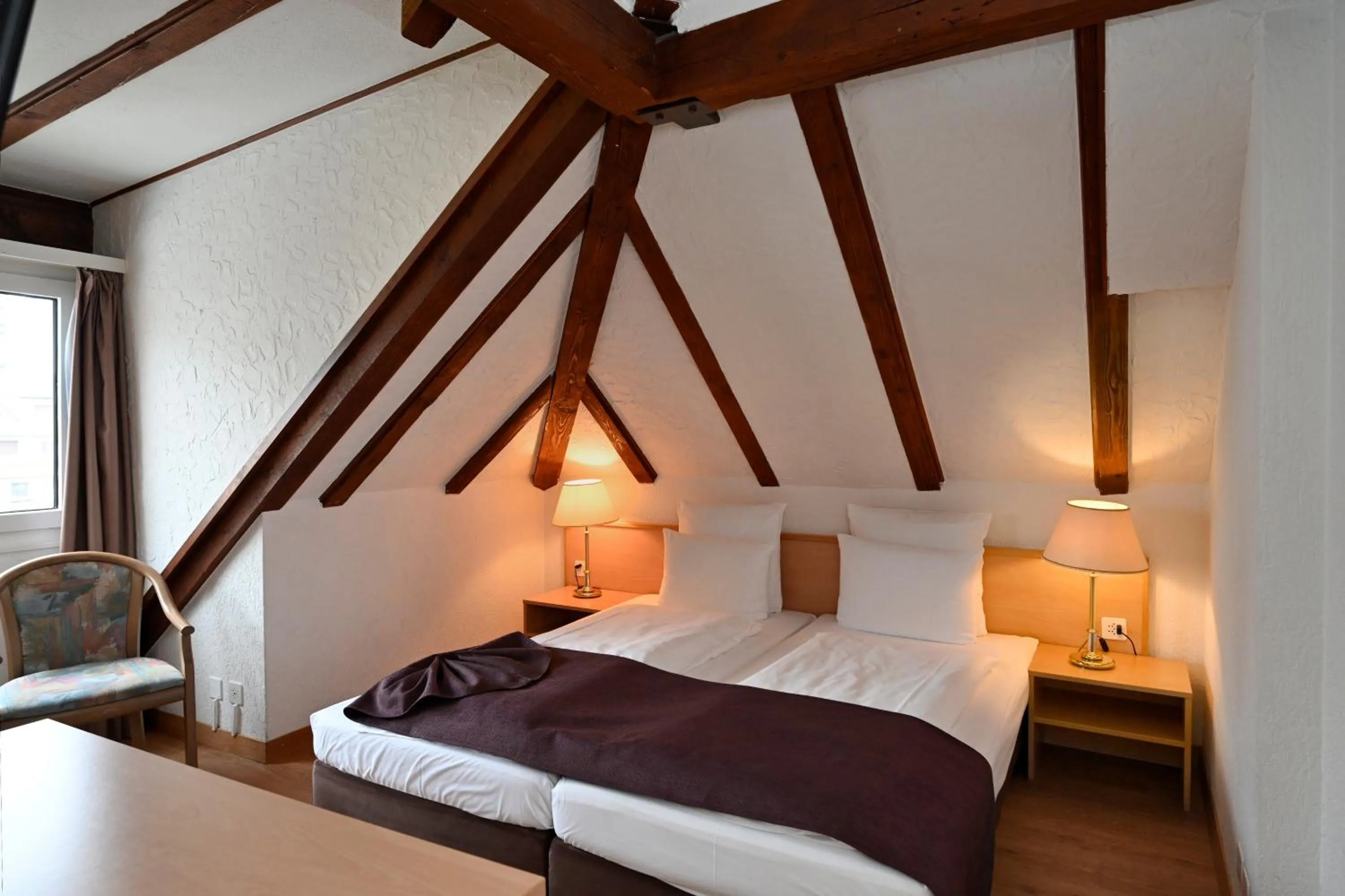 Photo of the whole room, Bed in Olympia Hotel Zurich