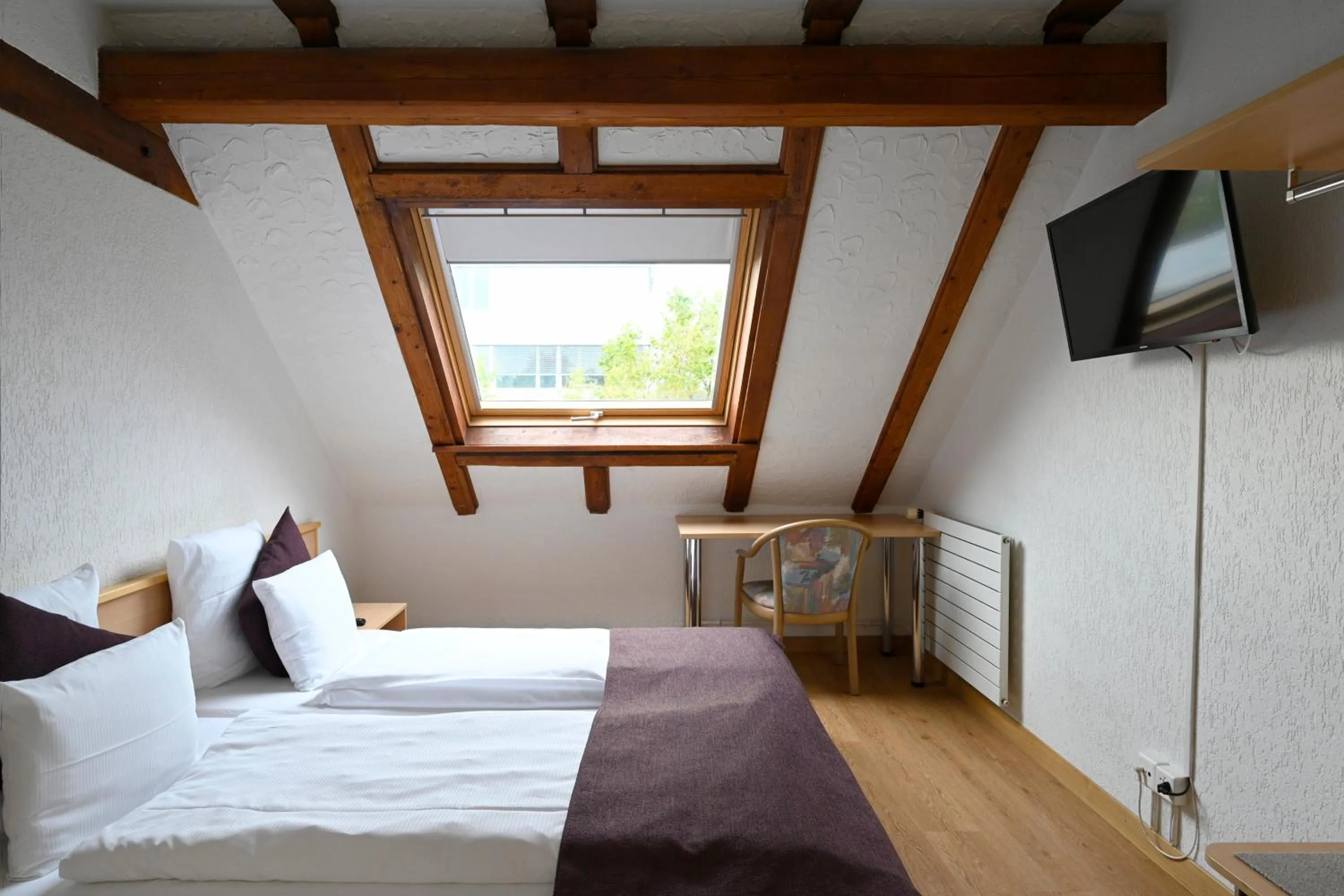 Photo of the whole room, Bed in Olympia Hotel Zurich