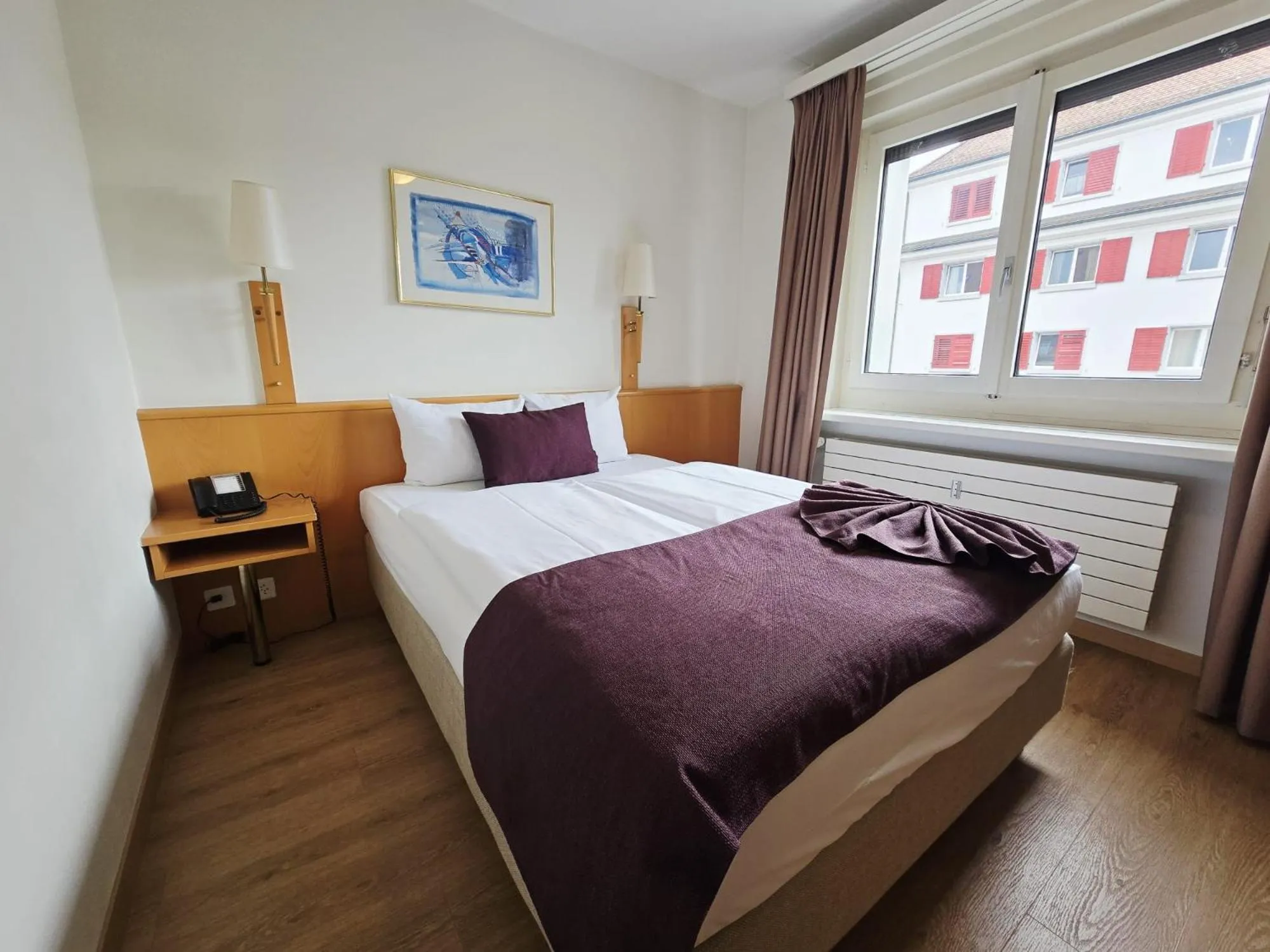 Bed in Olympia Hotel Zurich