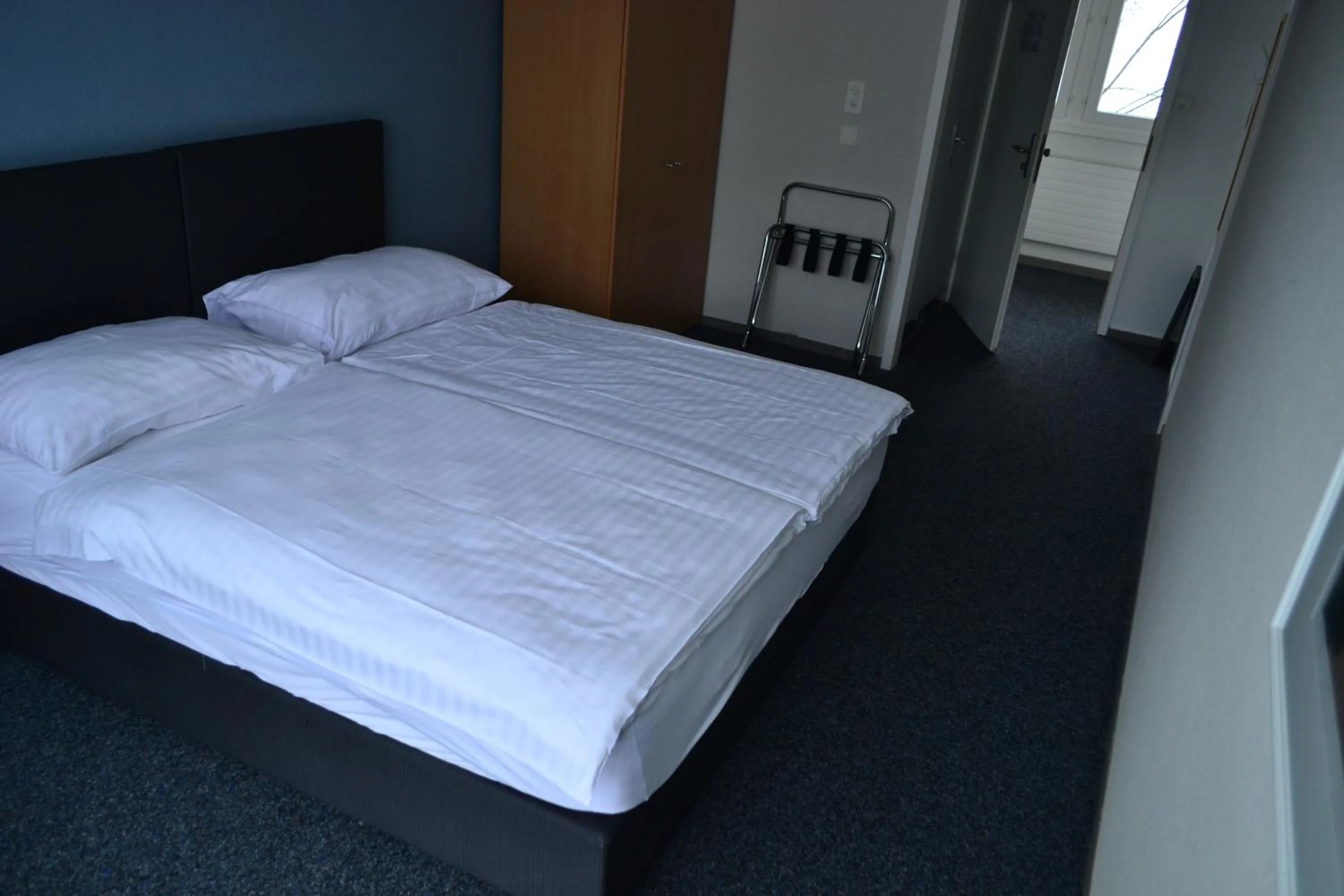 Bed in Hotel Les Rives Du Doubs