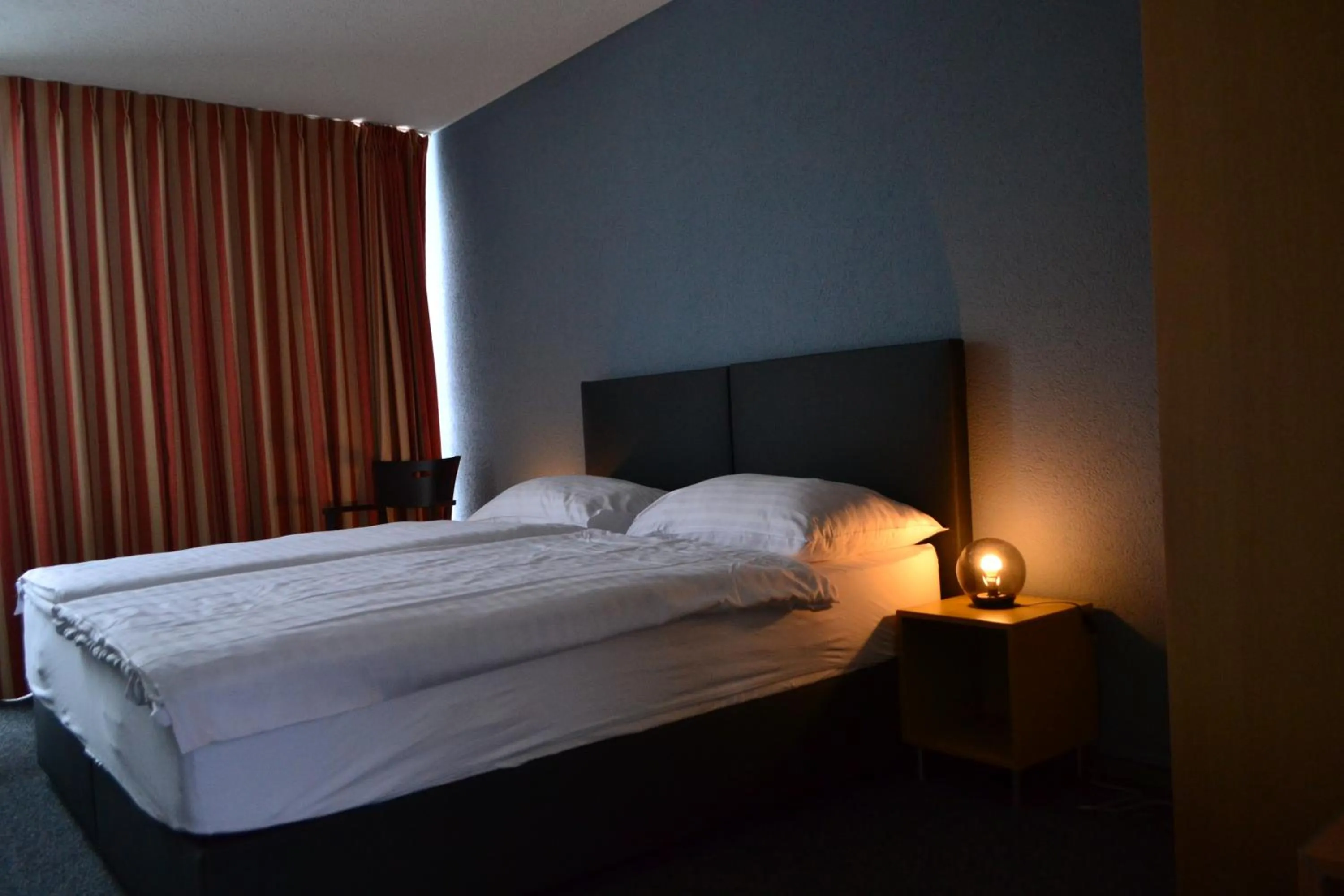 Bed in Hotel Les Rives Du Doubs