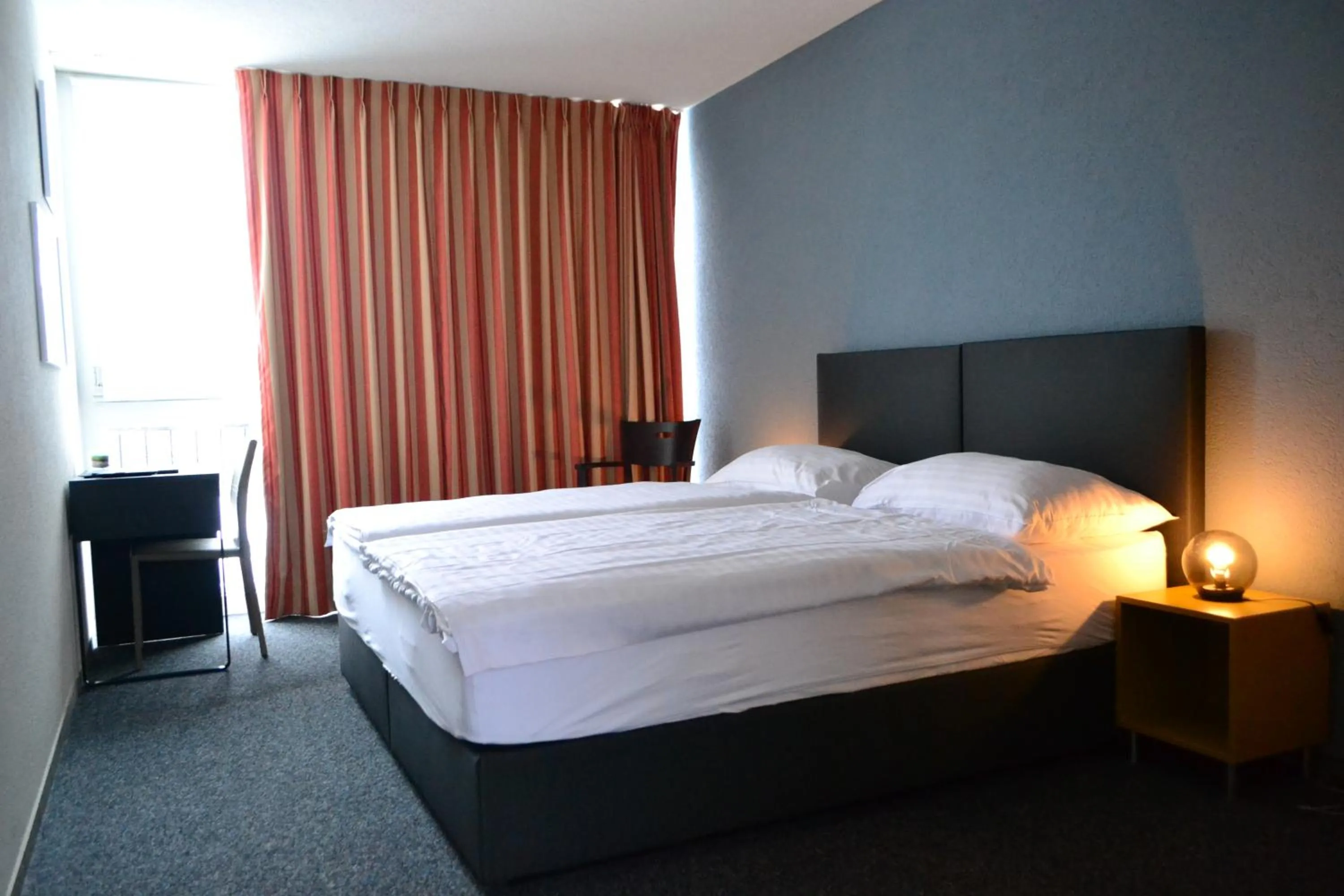 Bed in Hotel Les Rives Du Doubs