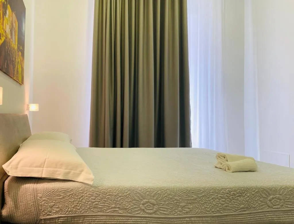 Bed in InCentroScalea B&B