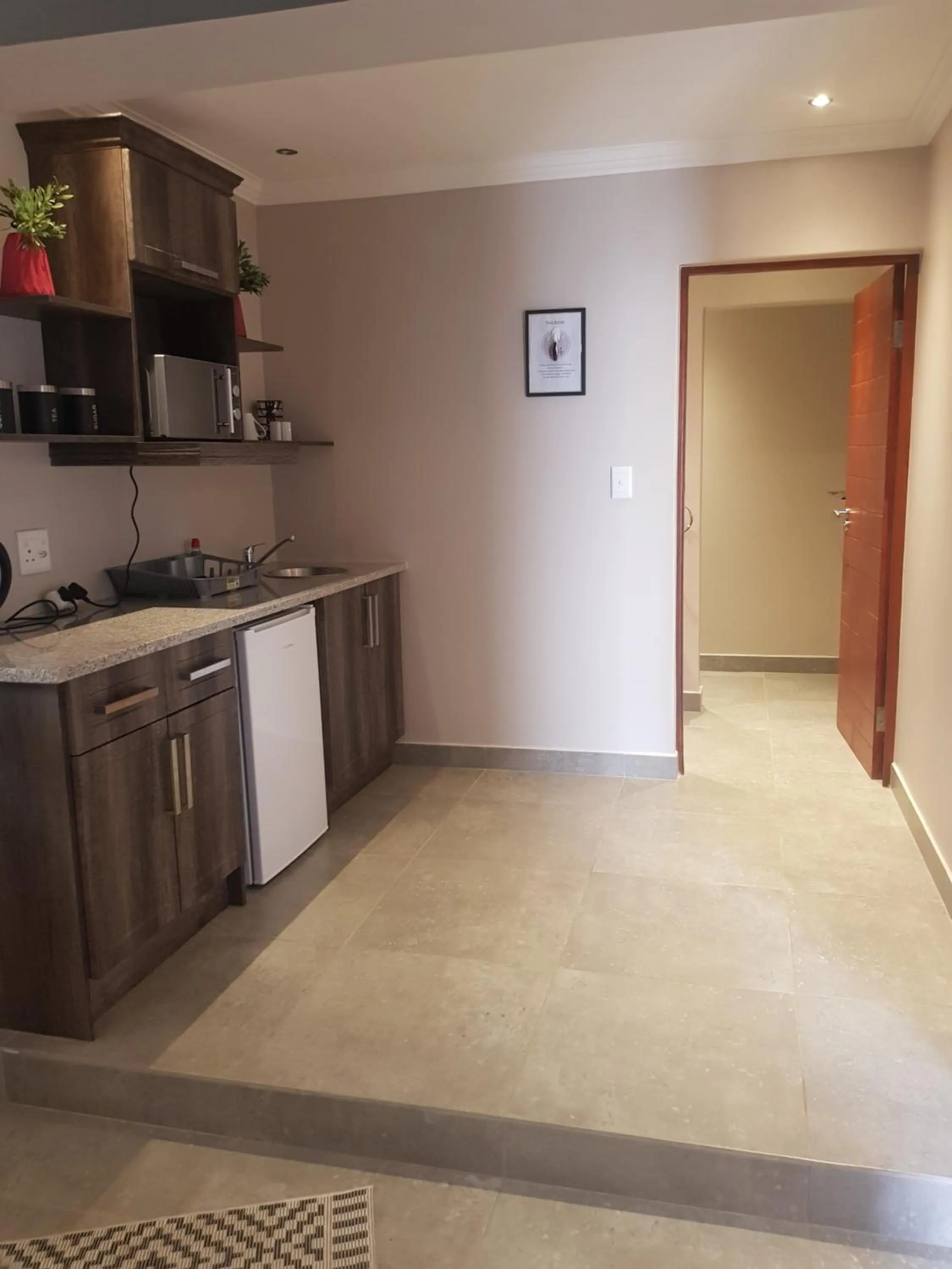 Kitchen or kitchenette in Sleep@84