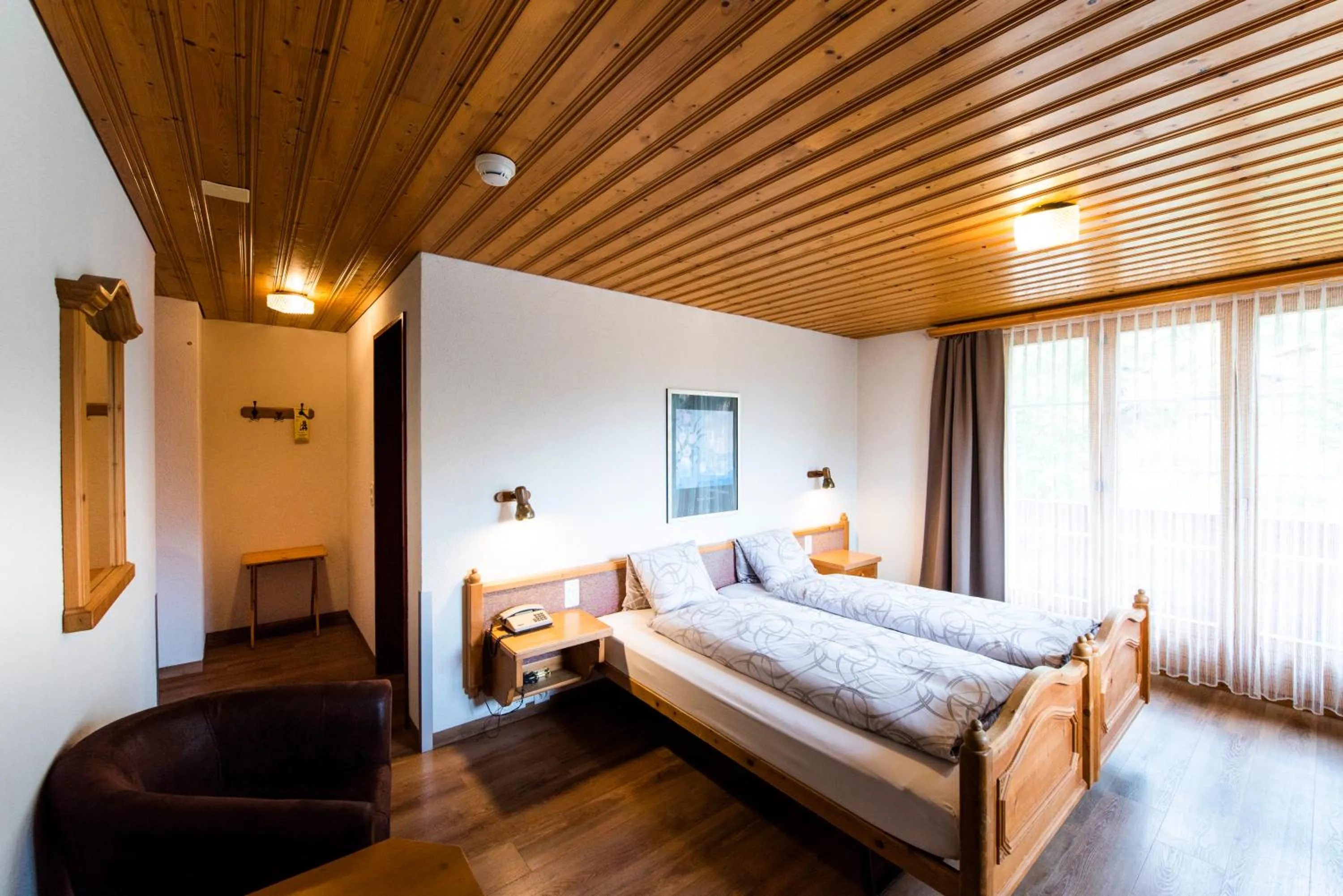 Photo of the whole room, Bed in Hotel Brienzerburli