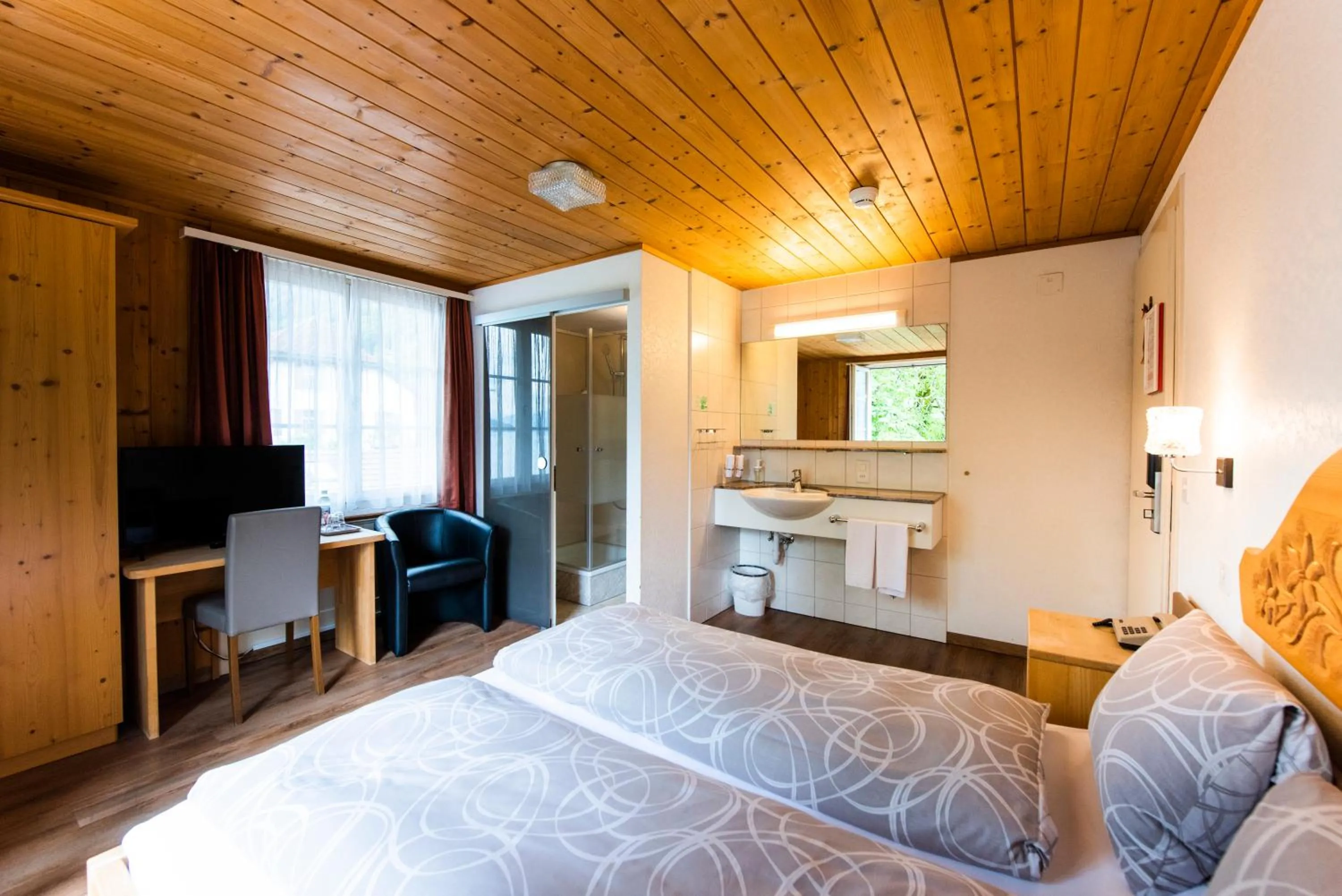 Bed in Hotel Brienzerburli