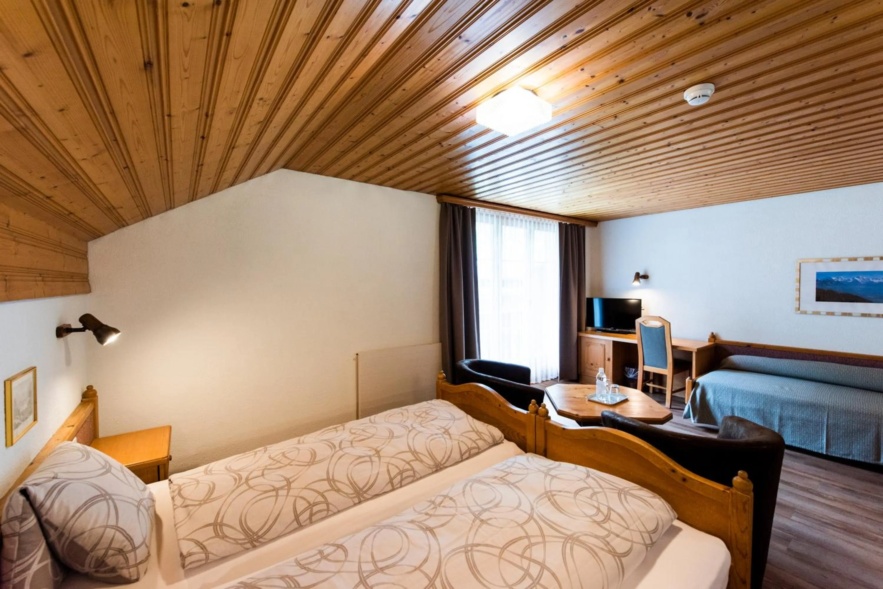 Bed in Hotel Brienzerburli