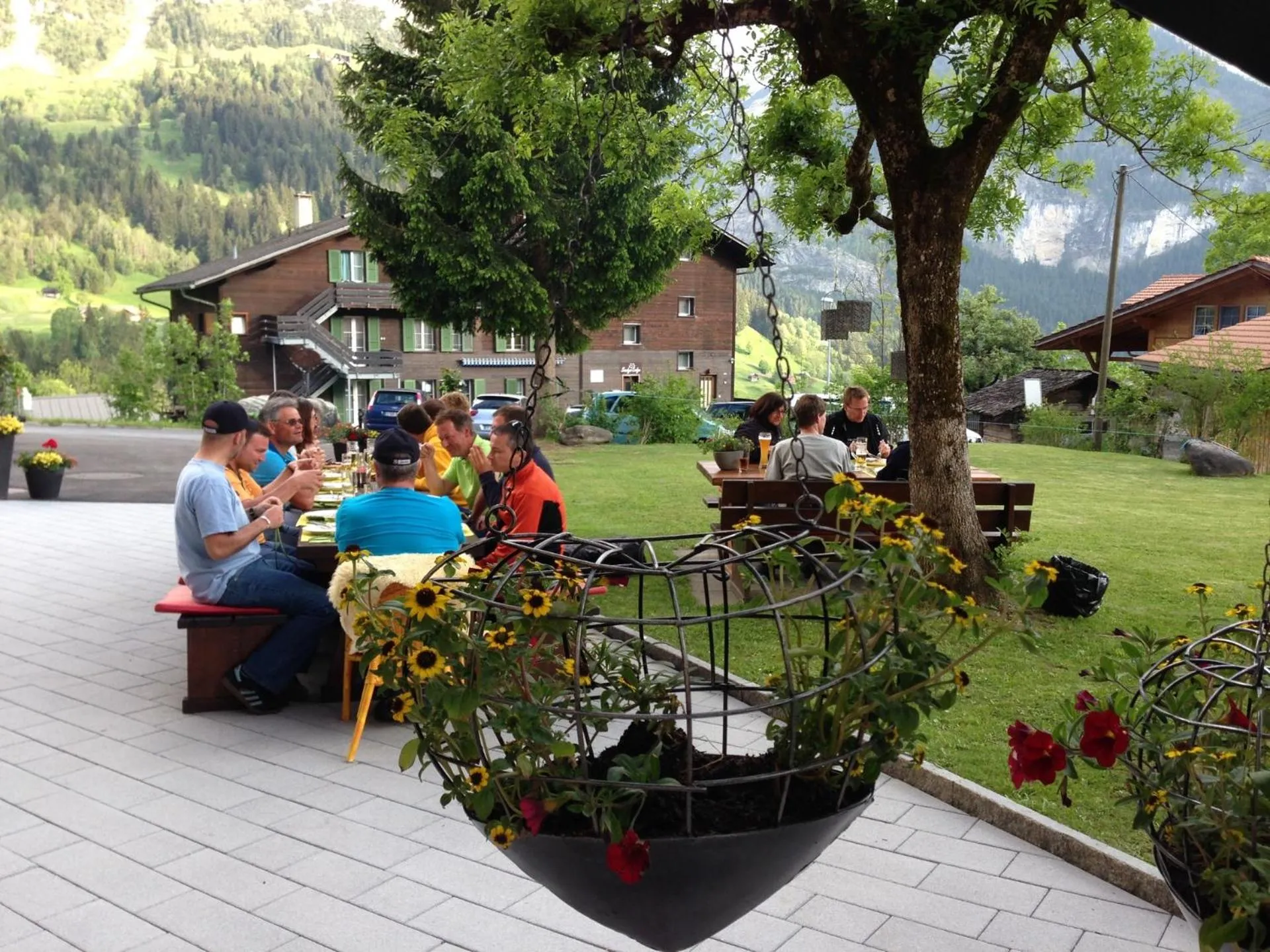 Garden view in Hotel Lauberhorn - Home for Outdoor Activities
