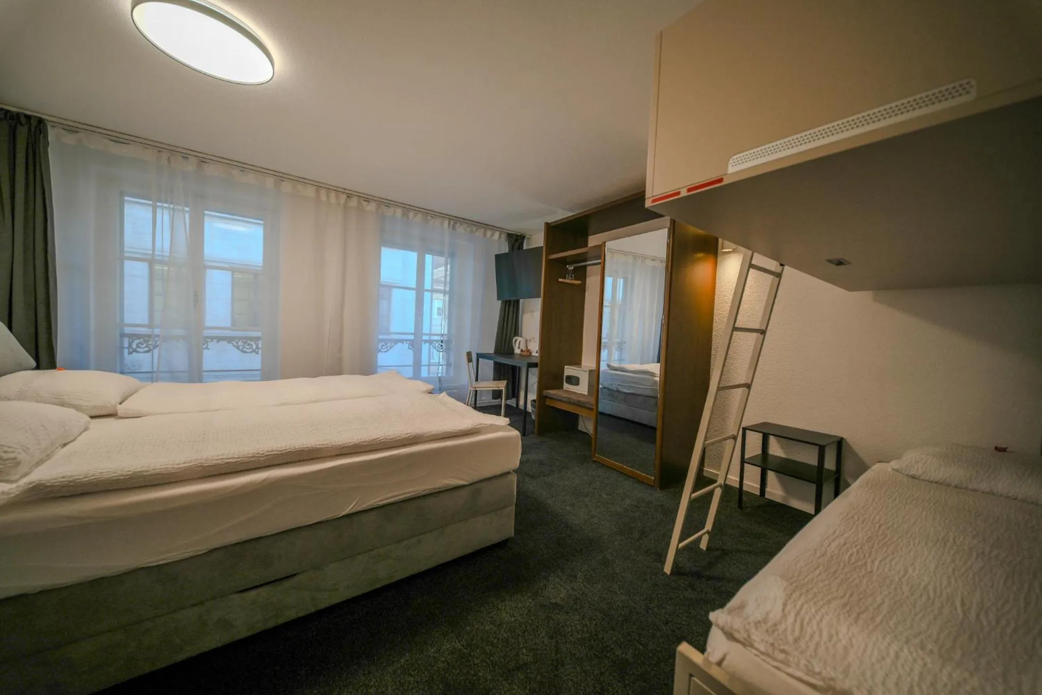 Photo of the whole room, Bed in Hotel Baslertor