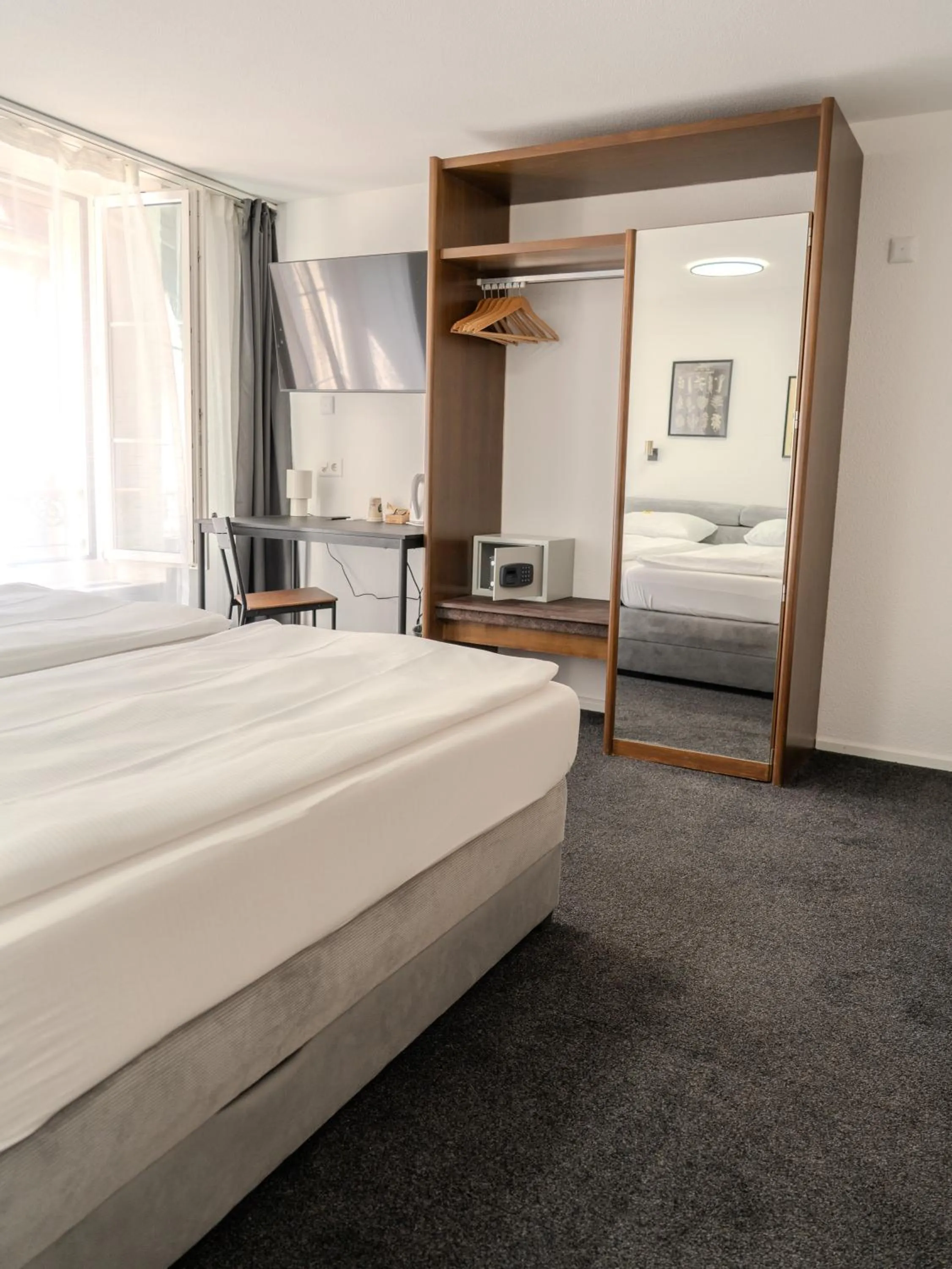 Photo of the whole room, Bed in Hotel Baslertor