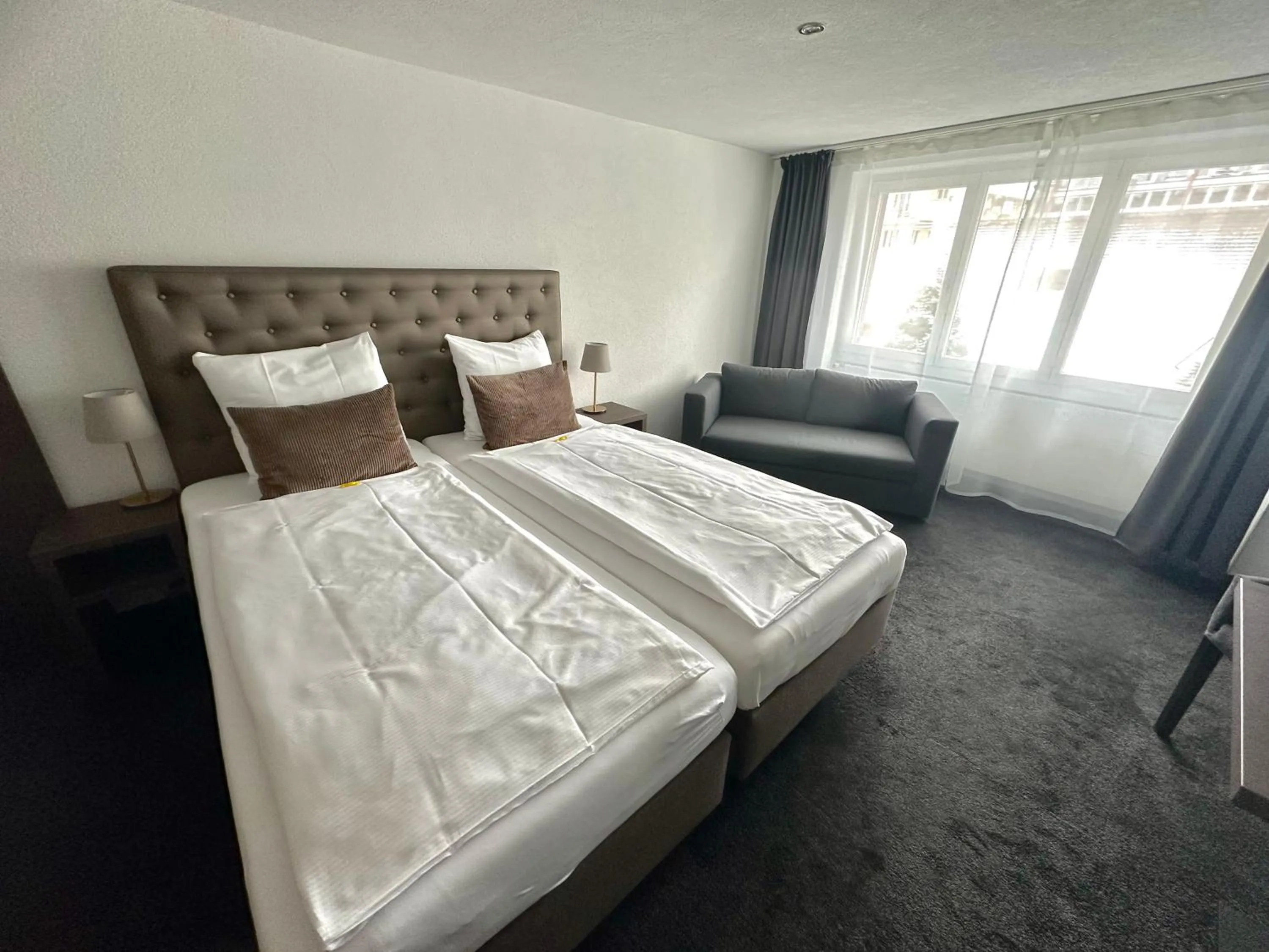 Photo of the whole room, Bed in Hotel Baslertor